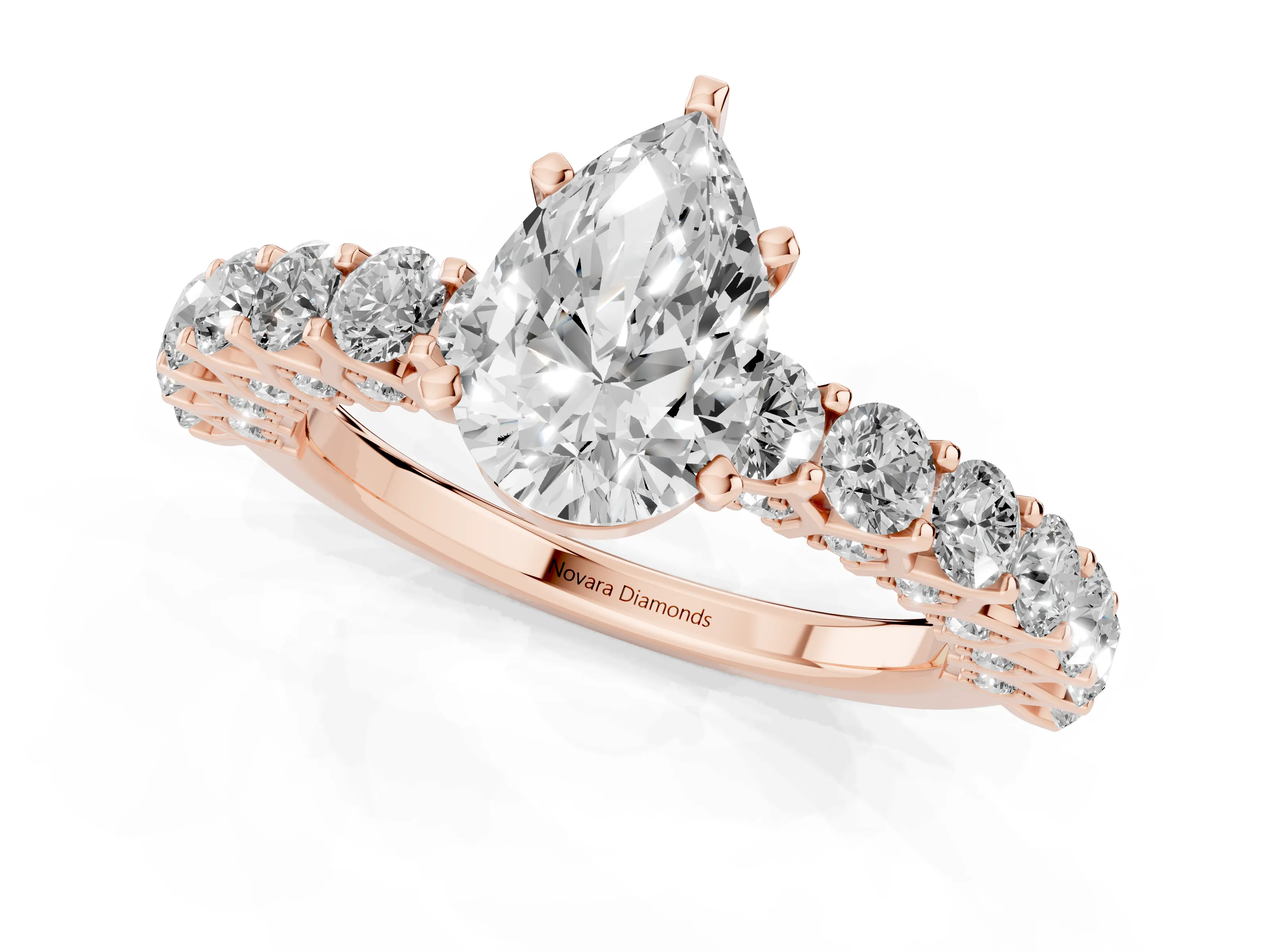Pear Cut Diamond Solitaire Ring Set in Rose gold with Shared Prong Pavé Band