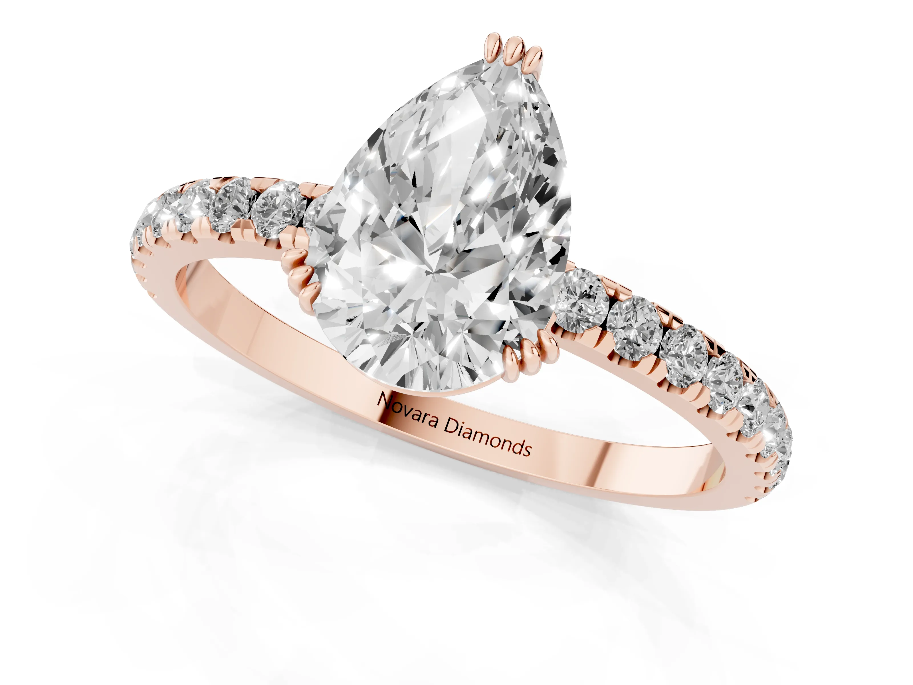 Pear Cut Diamond Brilliant Solitaire Set in Rose gold with Pavé Band and Claw Prong Setting