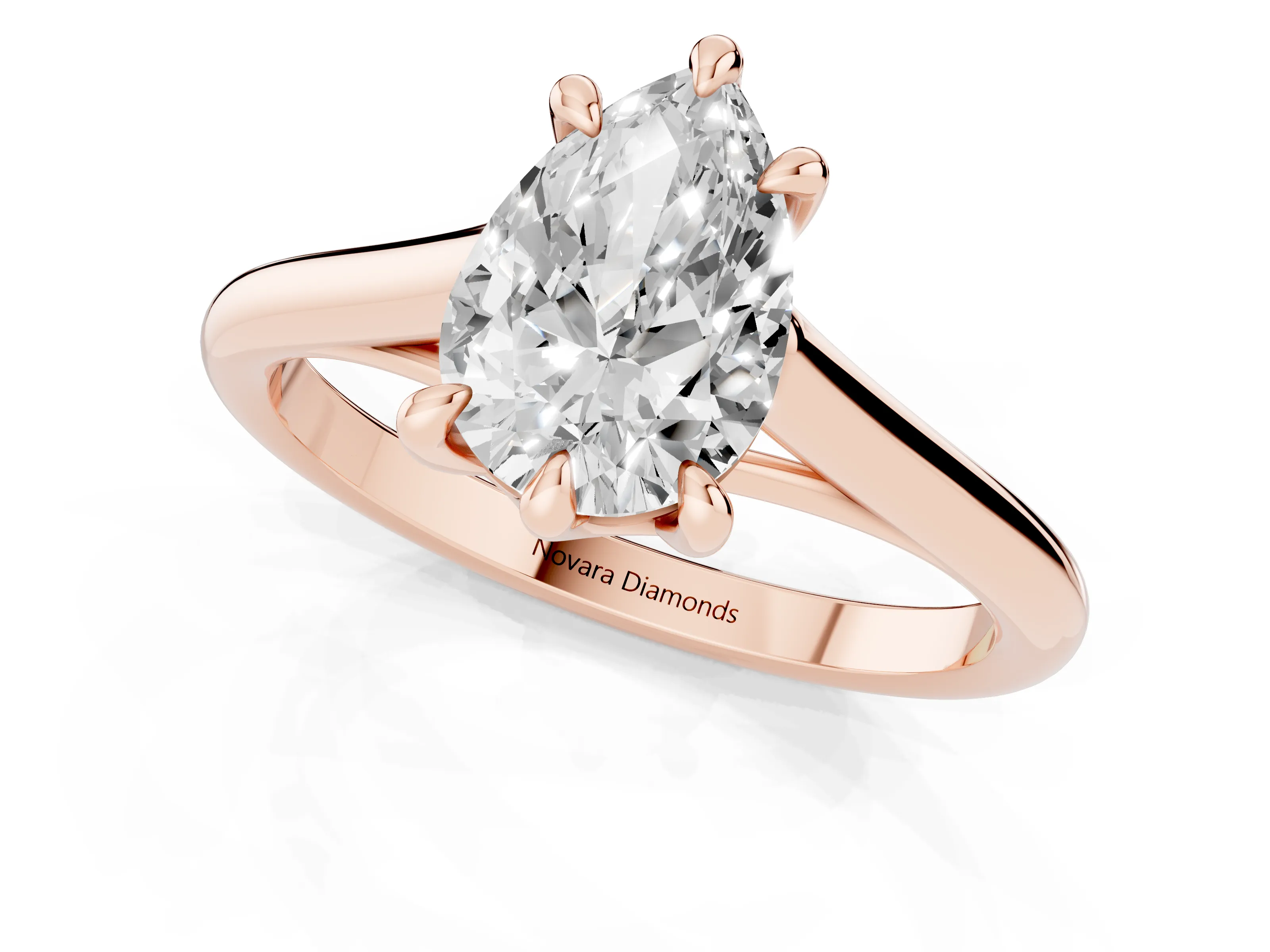 Pear Cut Diamond Solitaire Engagement Ring Set in Rose gold with Prong Setting and Plain Classic Band