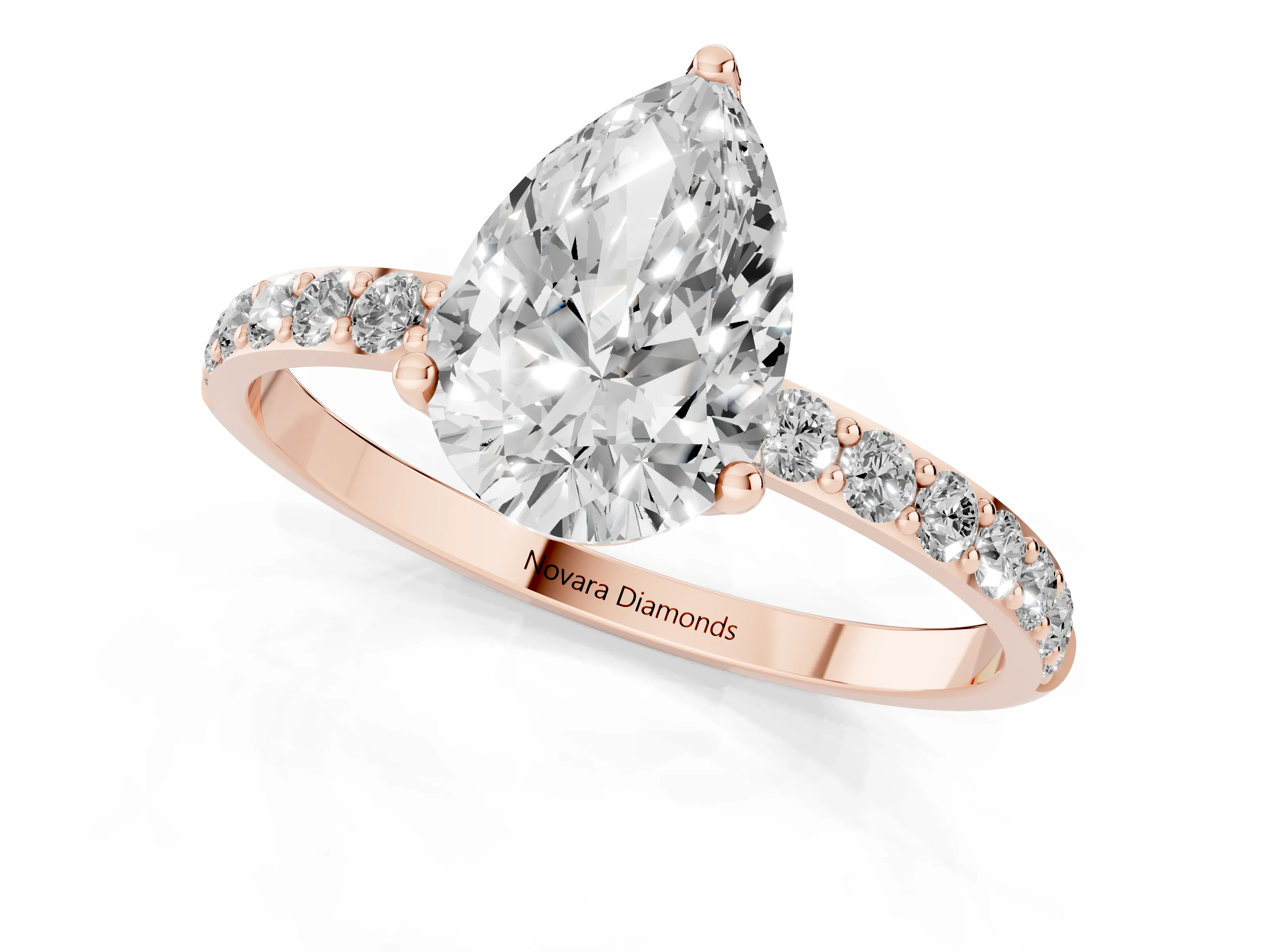 Pear Cut Diamond Solitaire Engagement Ring Set in Rose gold with Round Pavé Band and Prong Setting