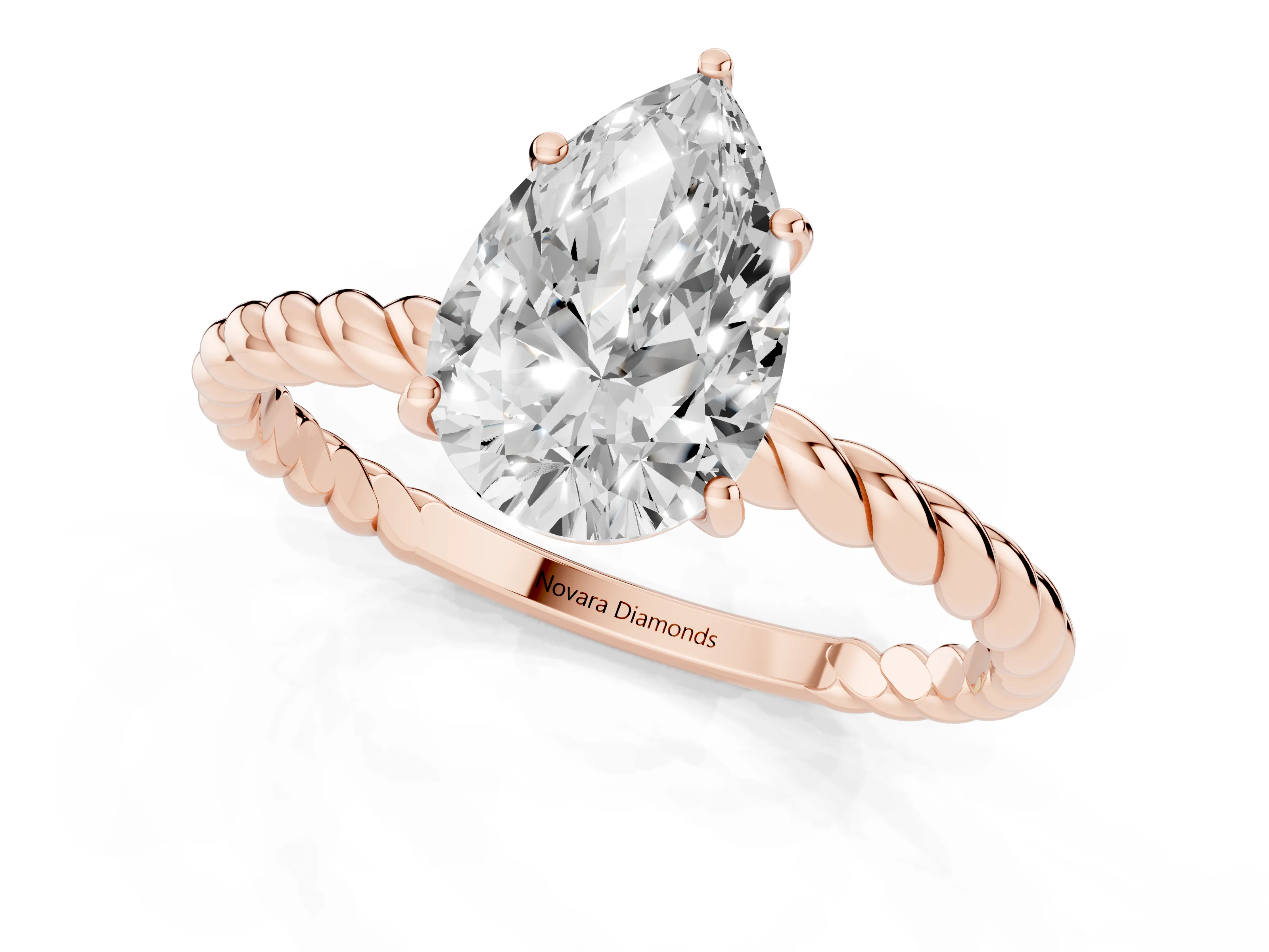 Pear Cut Diamond Solitaire Ring Set in Rose gold with Twist Band and Prong Setting