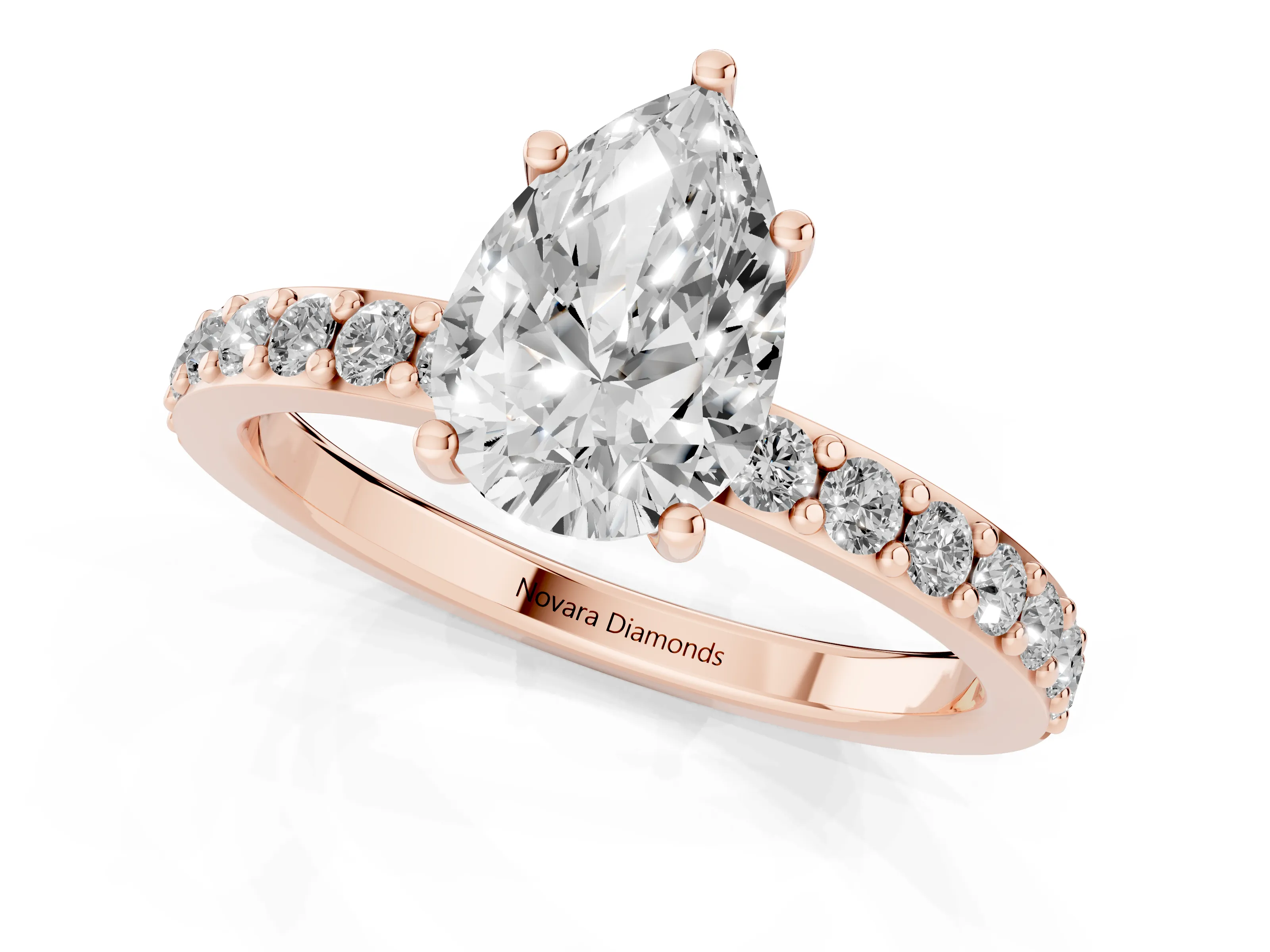 Pear Cut Diamond Solitaire Set in Rose gold with Round Pavé Band and Prong Setting