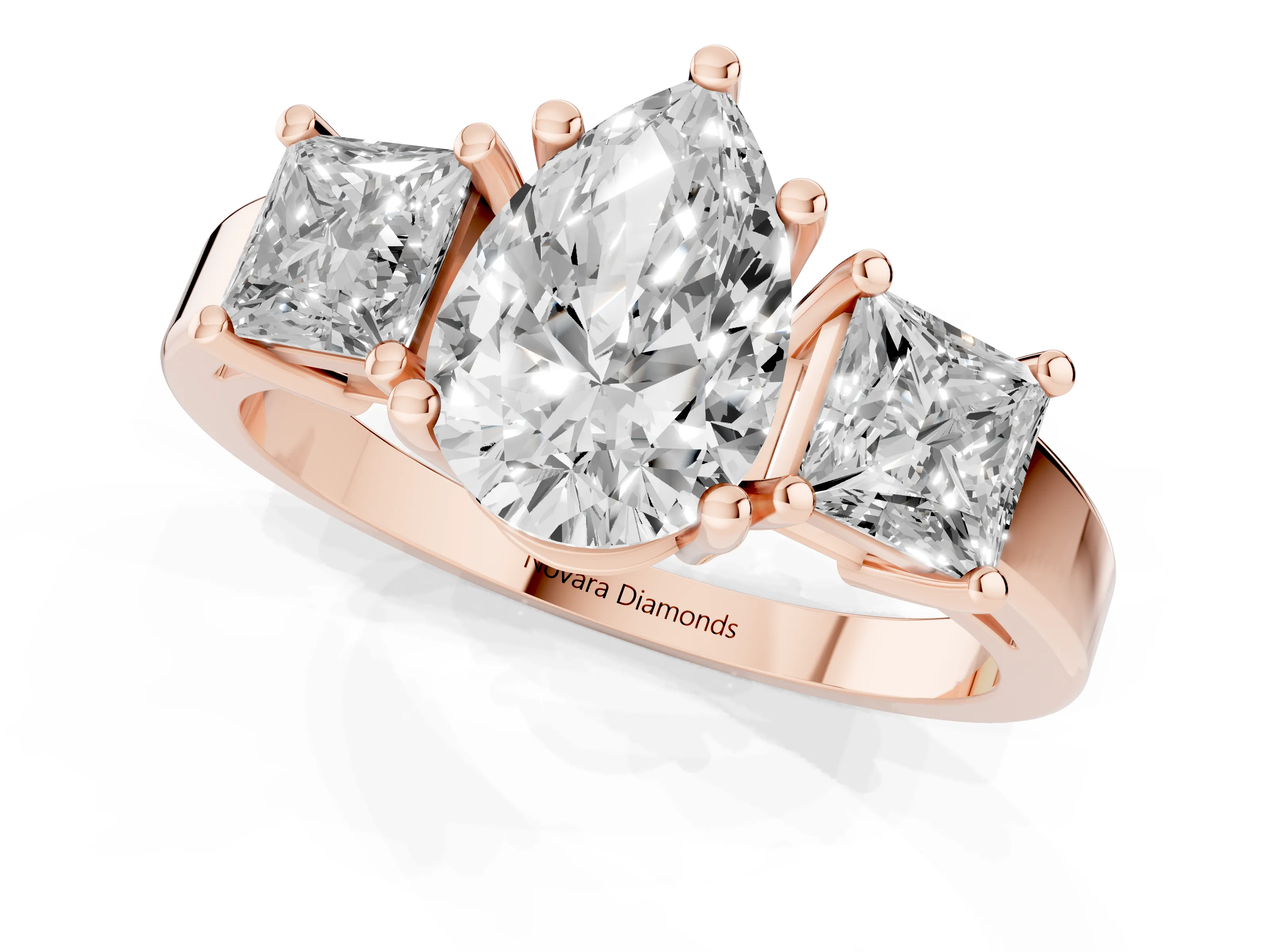 Three-Stone Pear Cut Diamond Solitaire Ring Set in Rose gold with Prong Setting