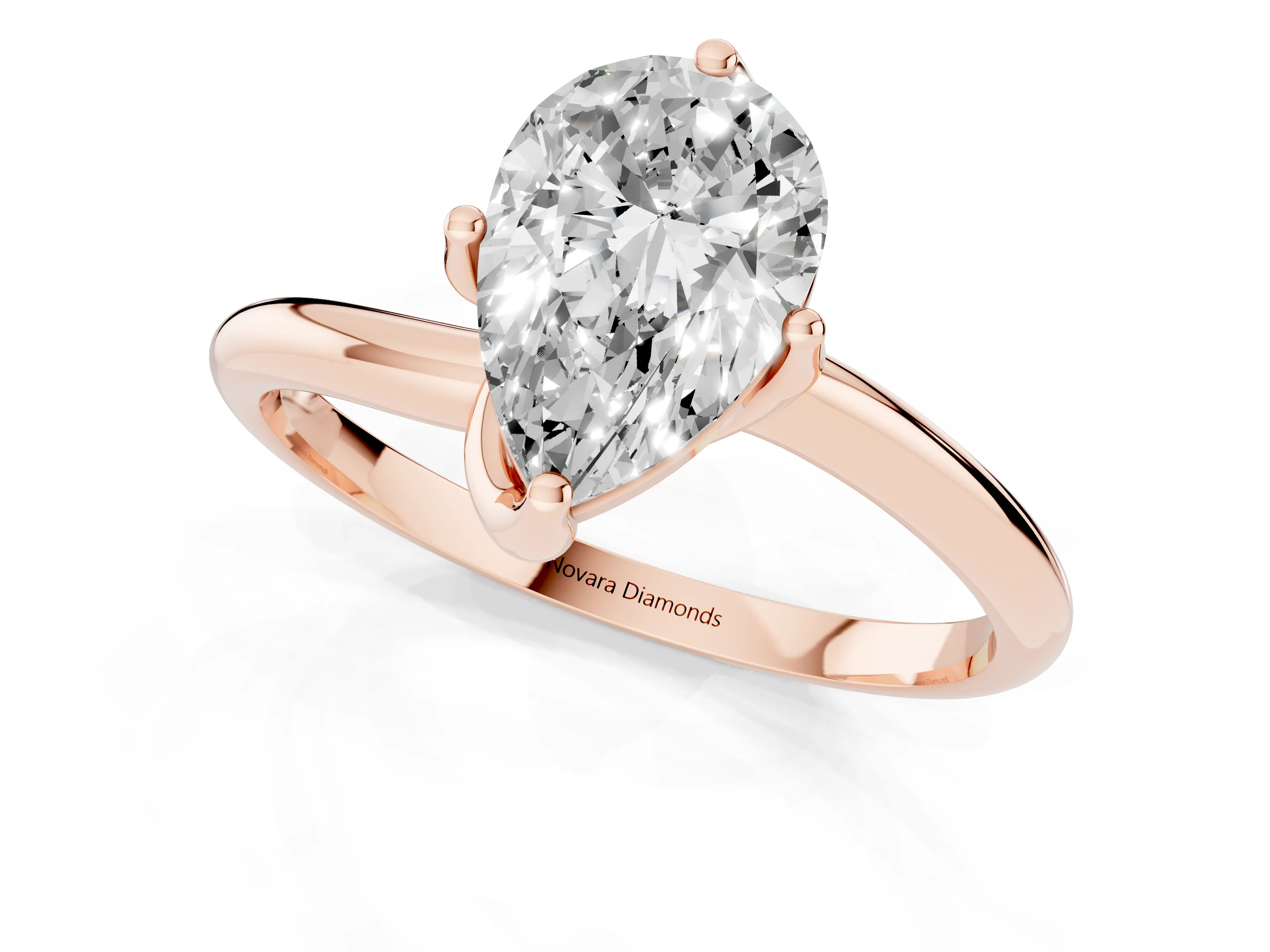Pear Cut Diamond Solitaire Engagement Ring Set in Rose gold with Classic Plain Band