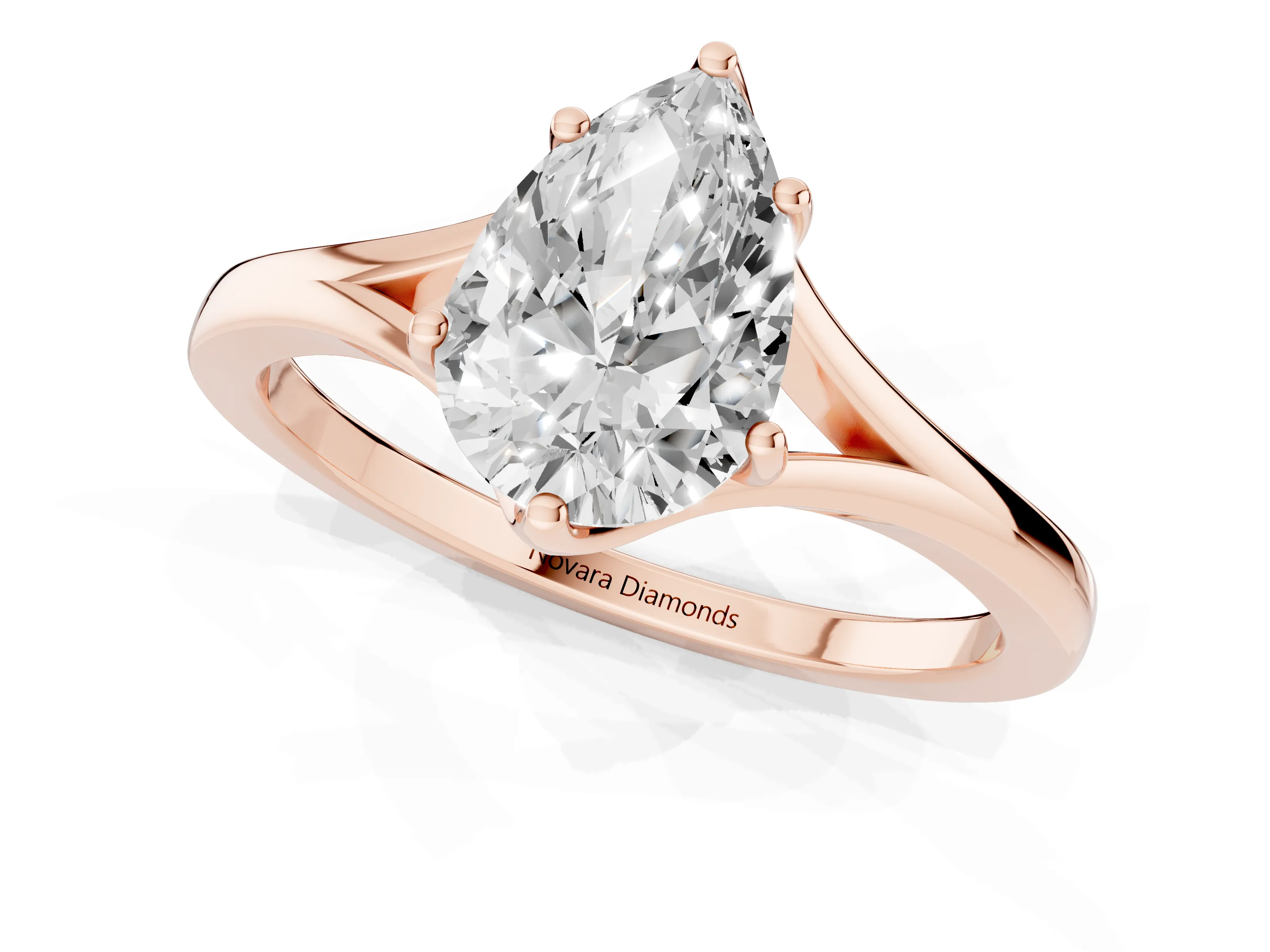 Pear Cut Diamond Solitaire Ring Set in Rose gold with Polished Tapered Band and Prong Setting