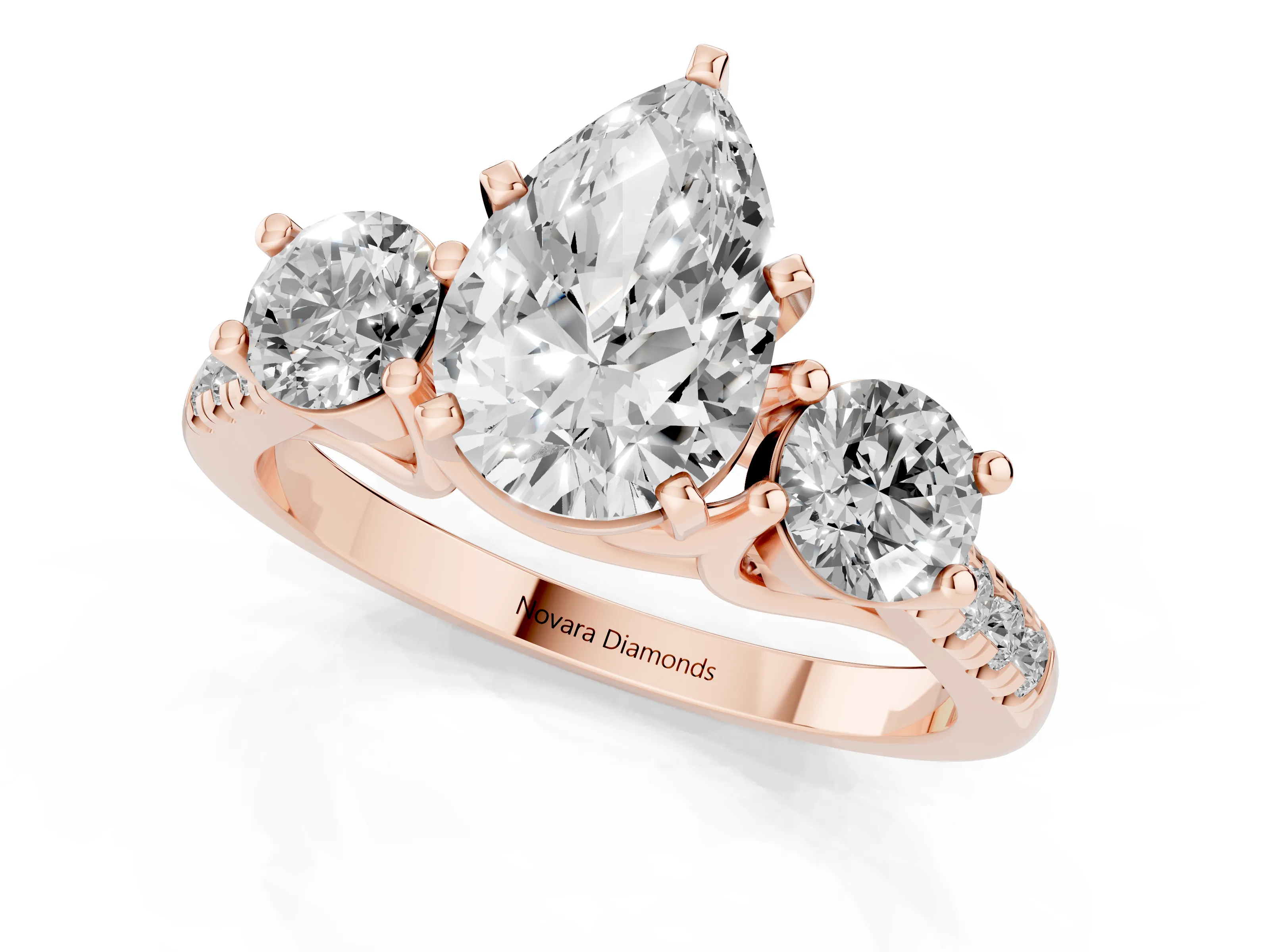 Three-Stone Pear Cut Diamond Pavé Band Ring Set in Rose gold with Prong-Set Trio