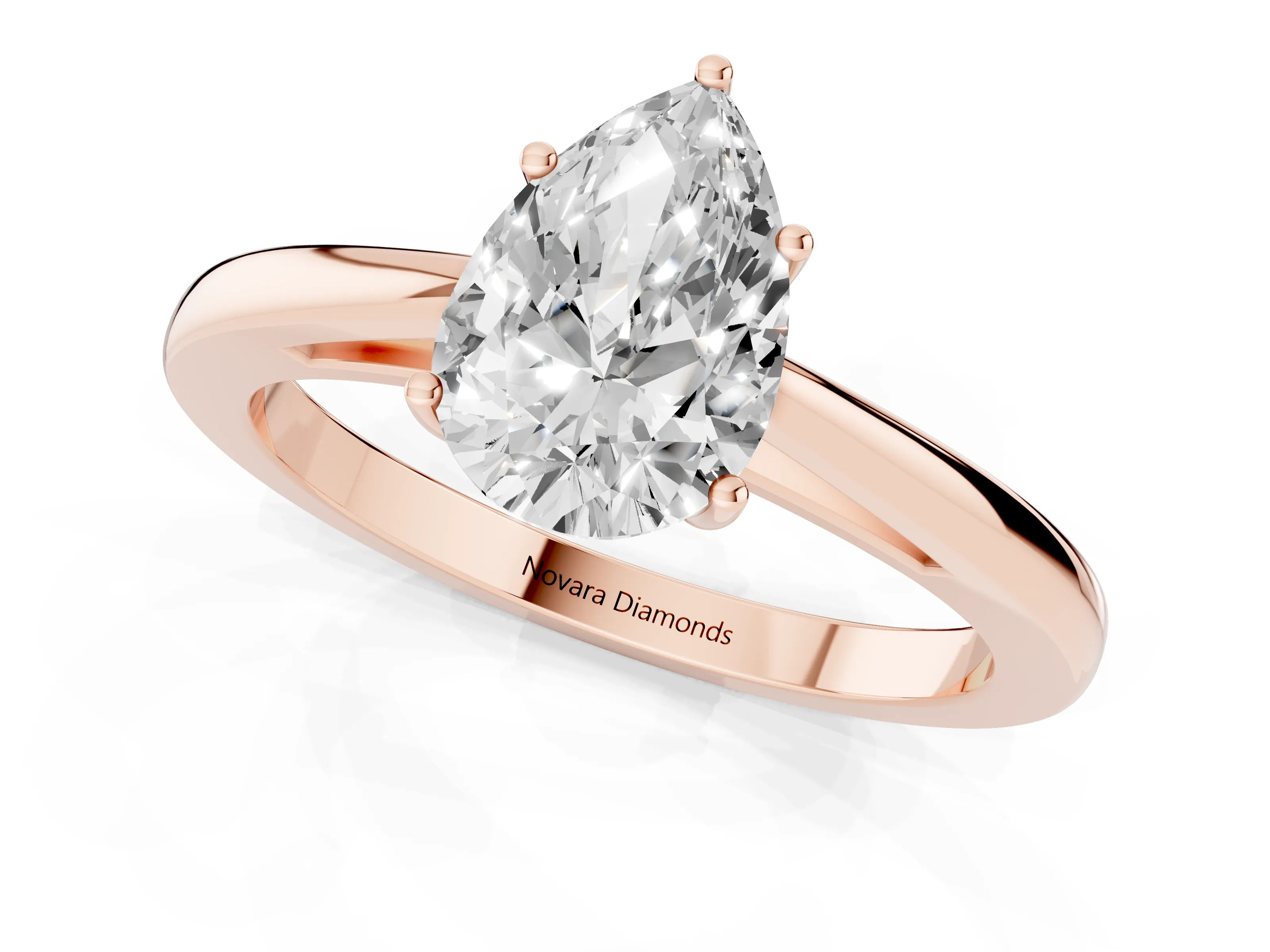 Pear Cut Diamond Solitaire Ring Set in Rose gold with Split Shank and Prong Setting