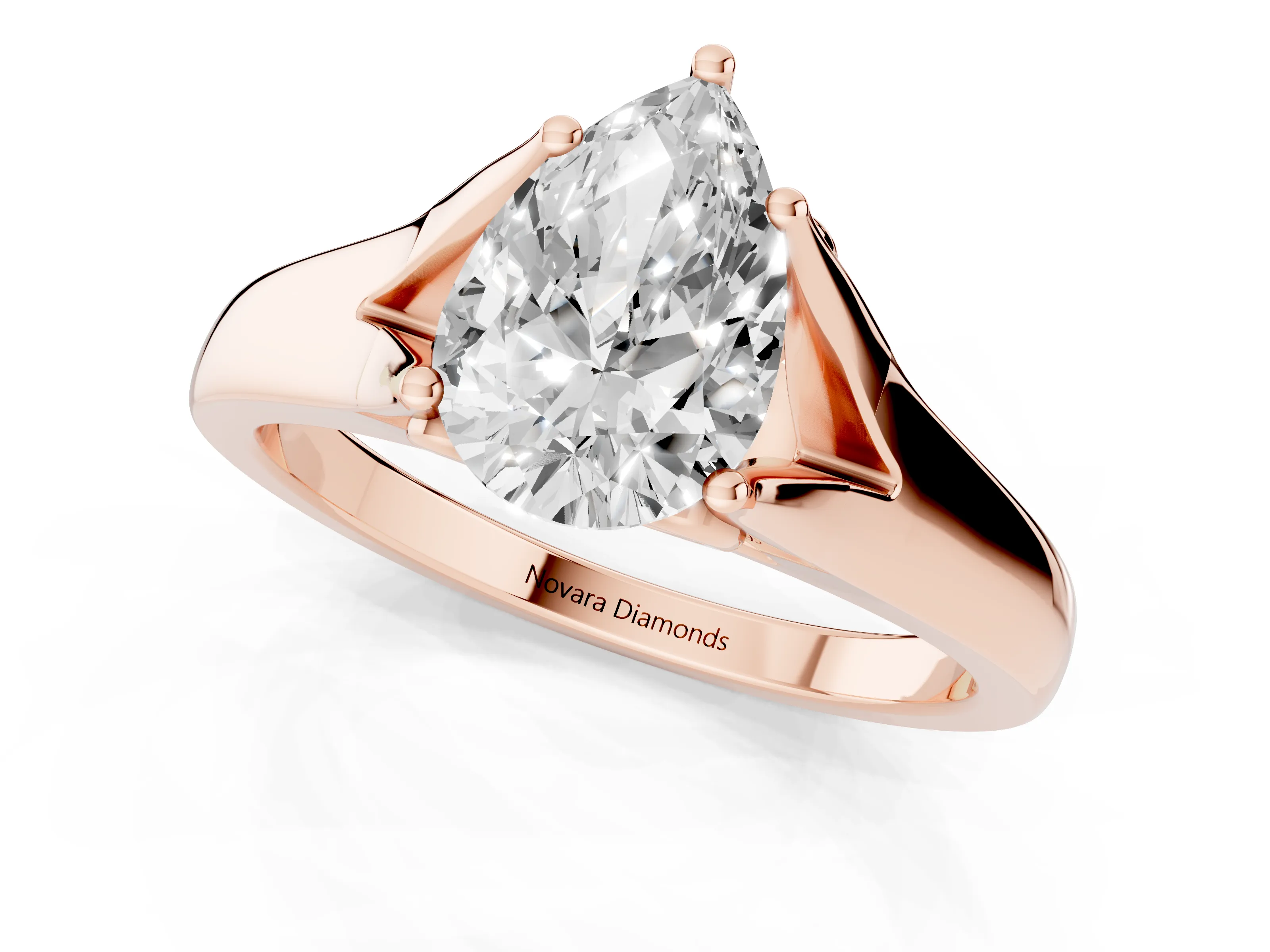 Pear Cut Diamond Solitaire Ring Set in Rose gold with Arched Cathedral Band and Prong Setting