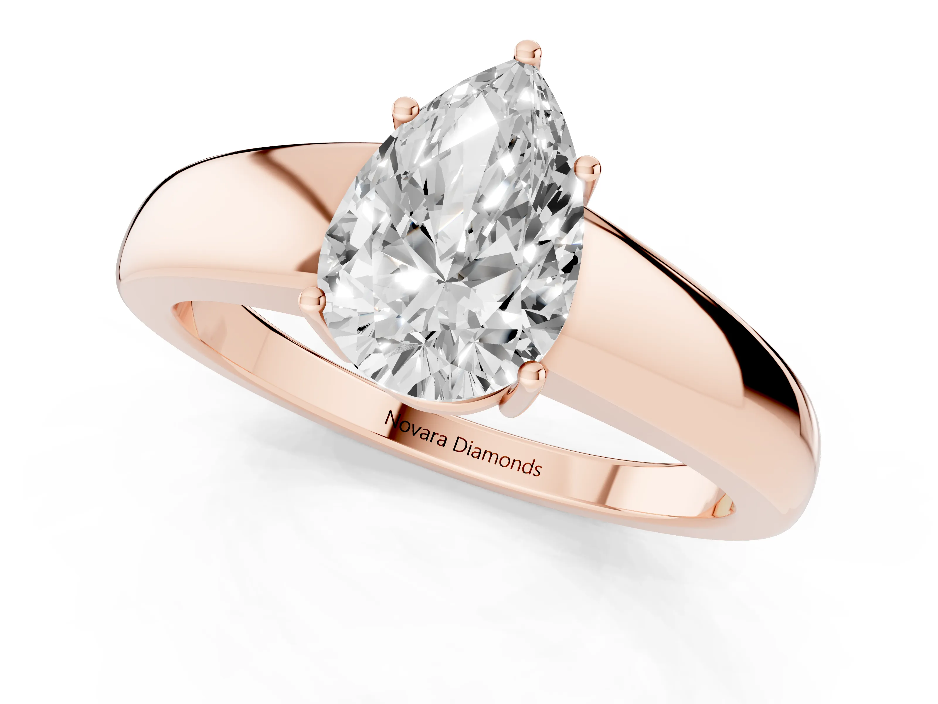 Pear Cut Diamond Solitaire Ring Set in Rose gold with Tapered Band and Prong Setting
