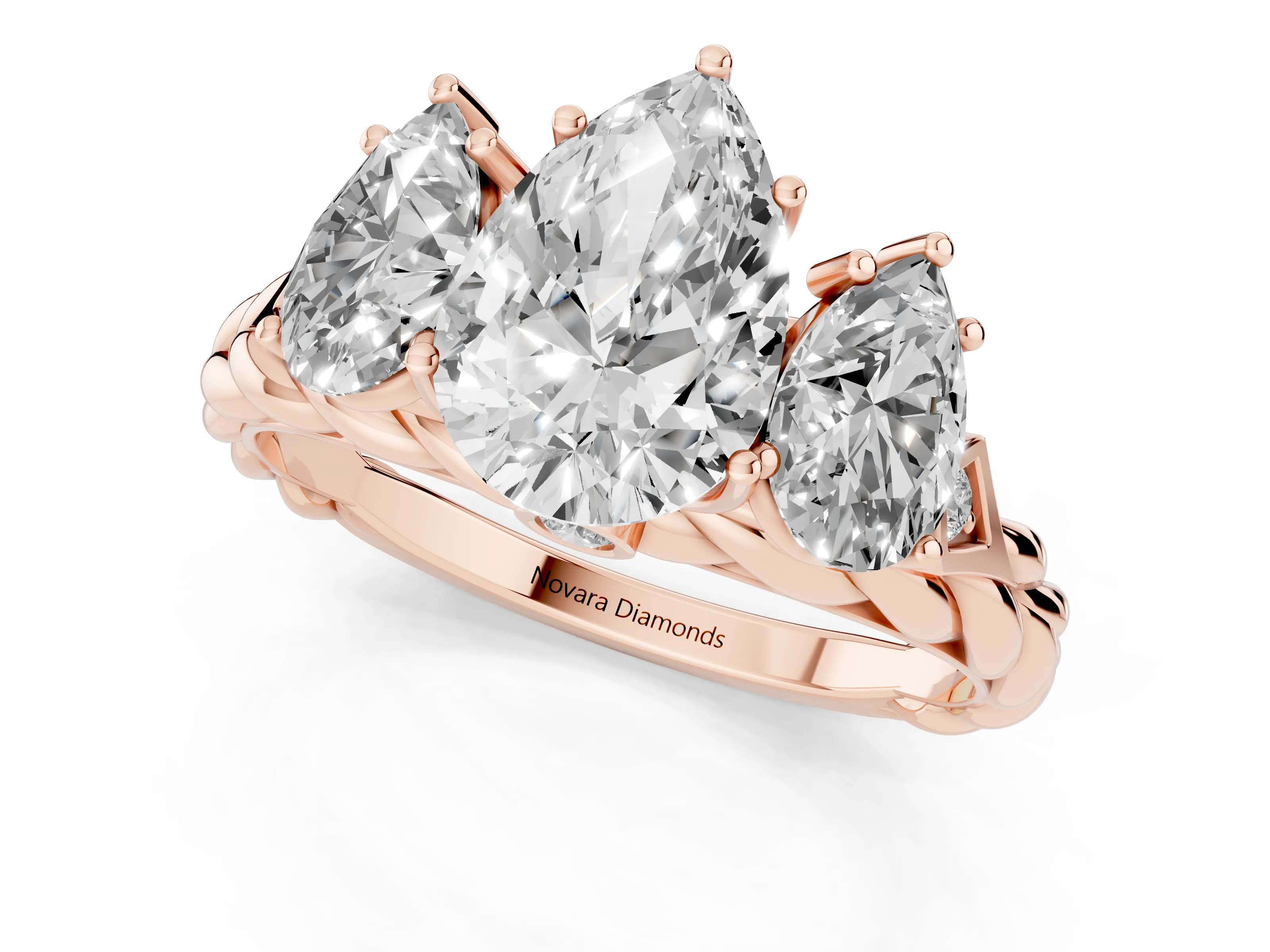 Pear Cut Diamond Three-Stone Ring Set in Rose gold with Braided Band