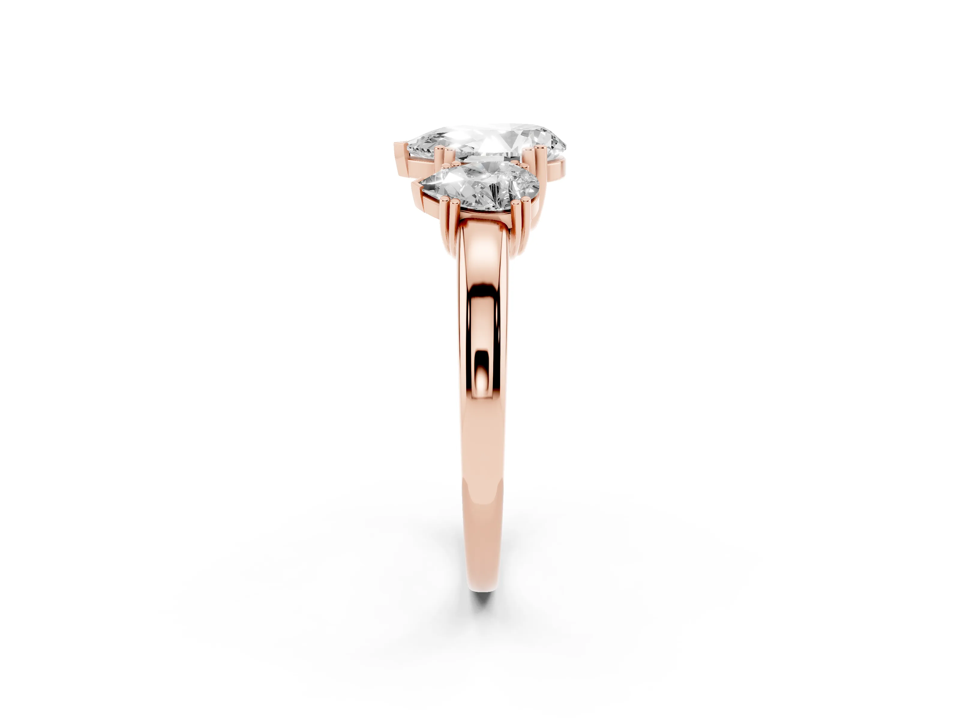 Pear Cut Diamond Three-Stone Ring Set in Rose gold with Polished Channel-Set Band
