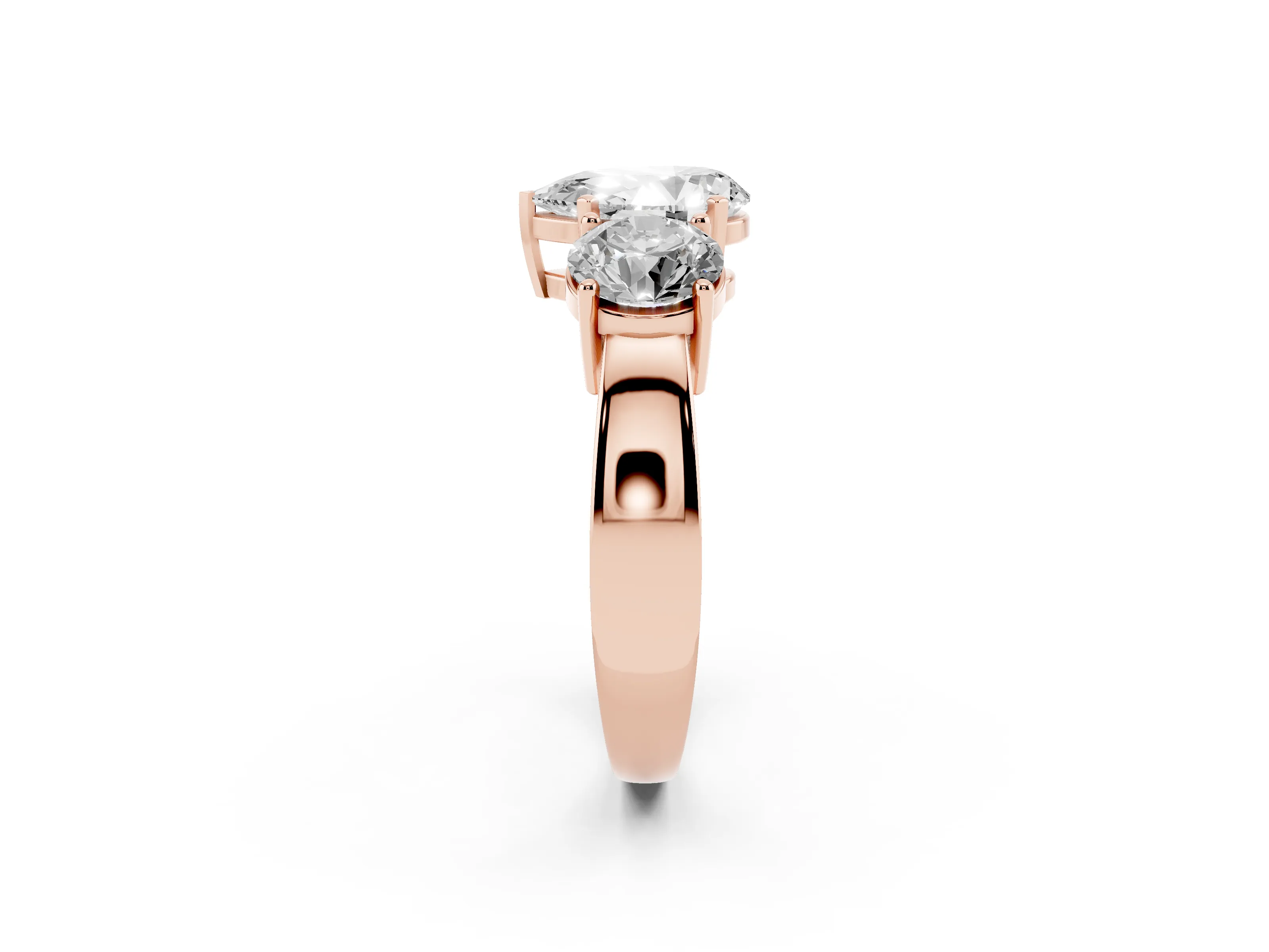 Pear Cut Diamond Three-Stone Ring Set in Rose gold with Round Side Stones and Classic Band