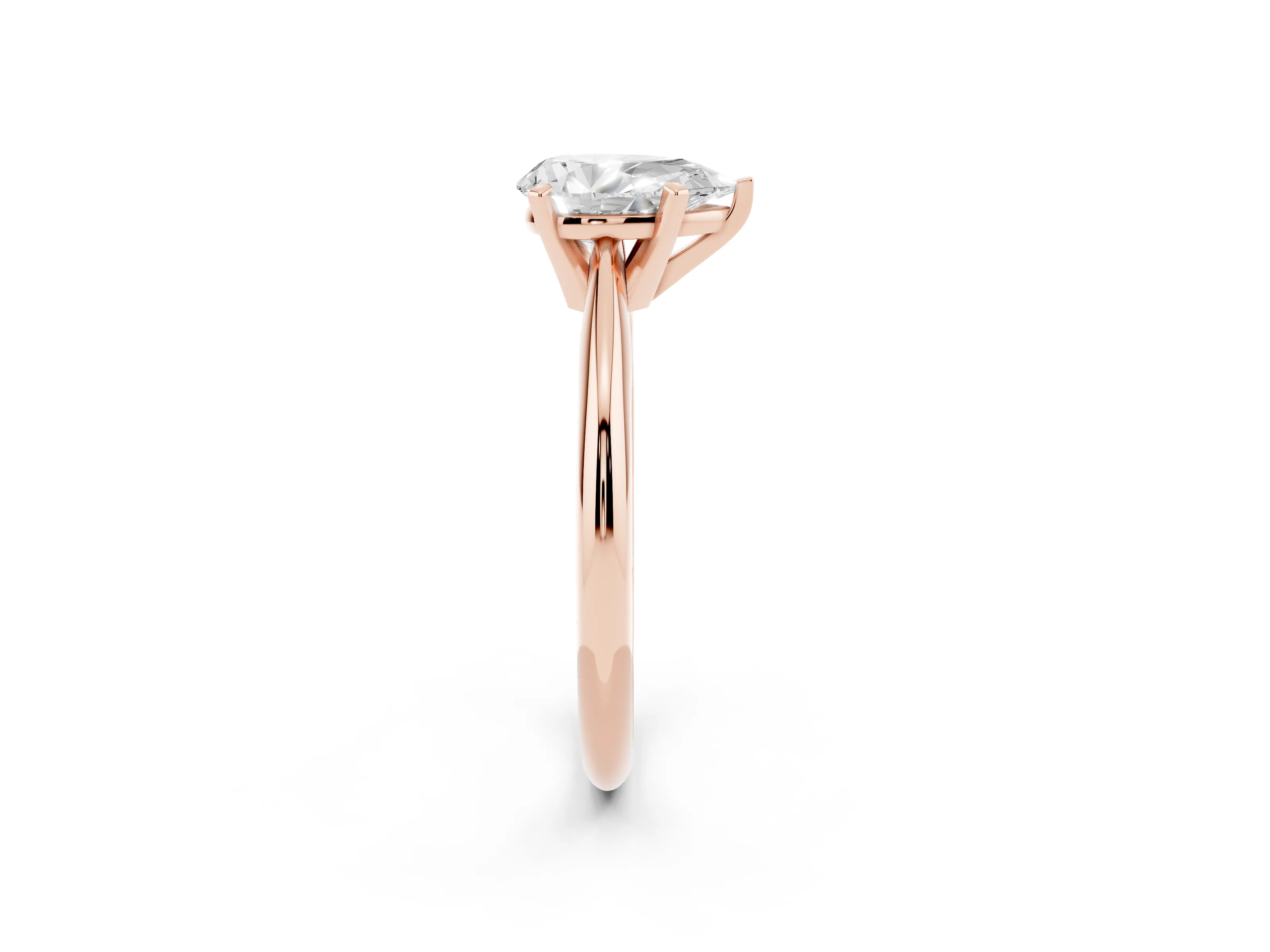Pear Cut Diamond Solitaire Ring Set in Rose gold with Prong Setting on a Plain Round Band