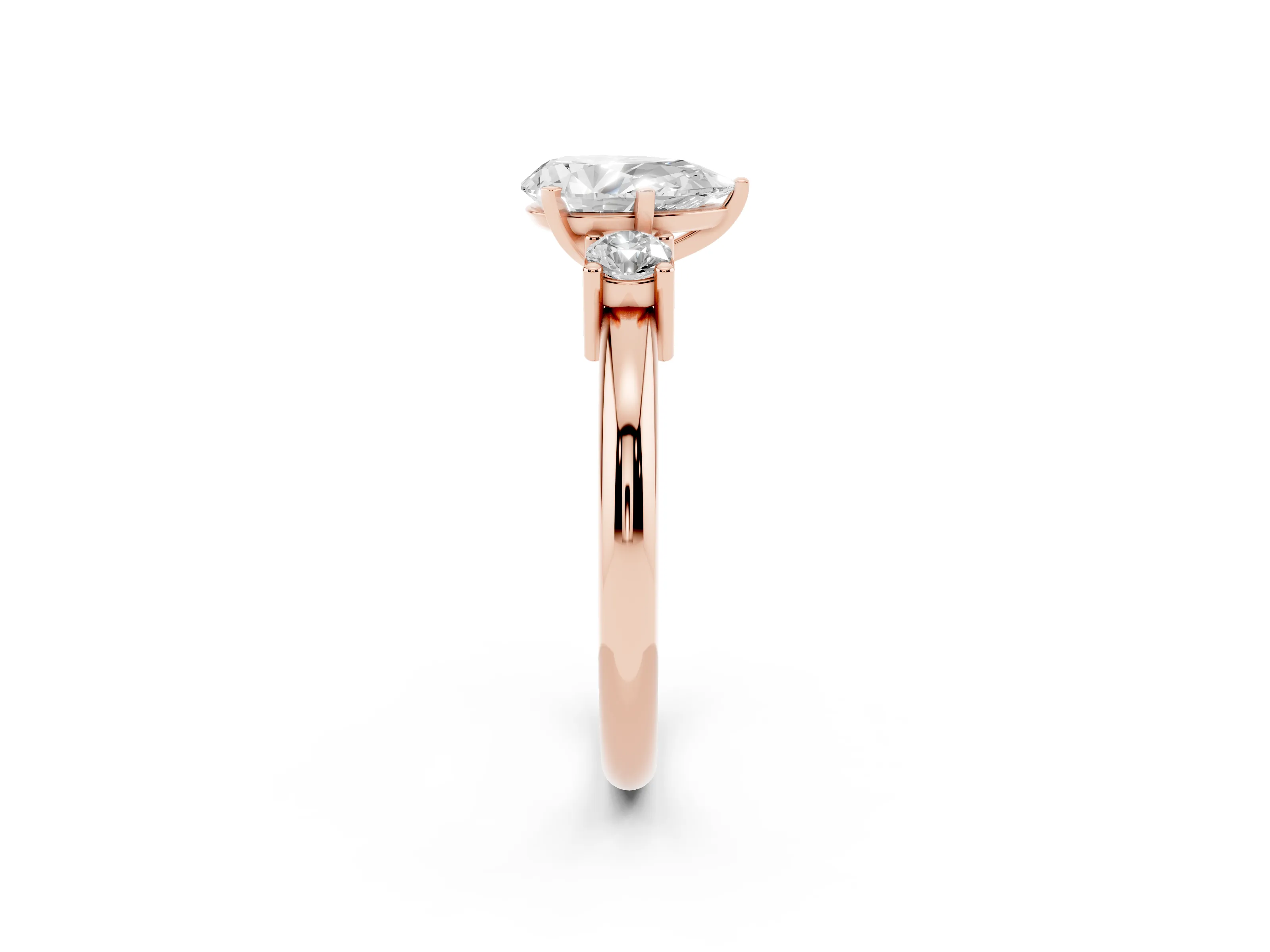 Three-Stone Pear Cut Diamond Ring Set in Rose gold with Prong Setting and Plain Band