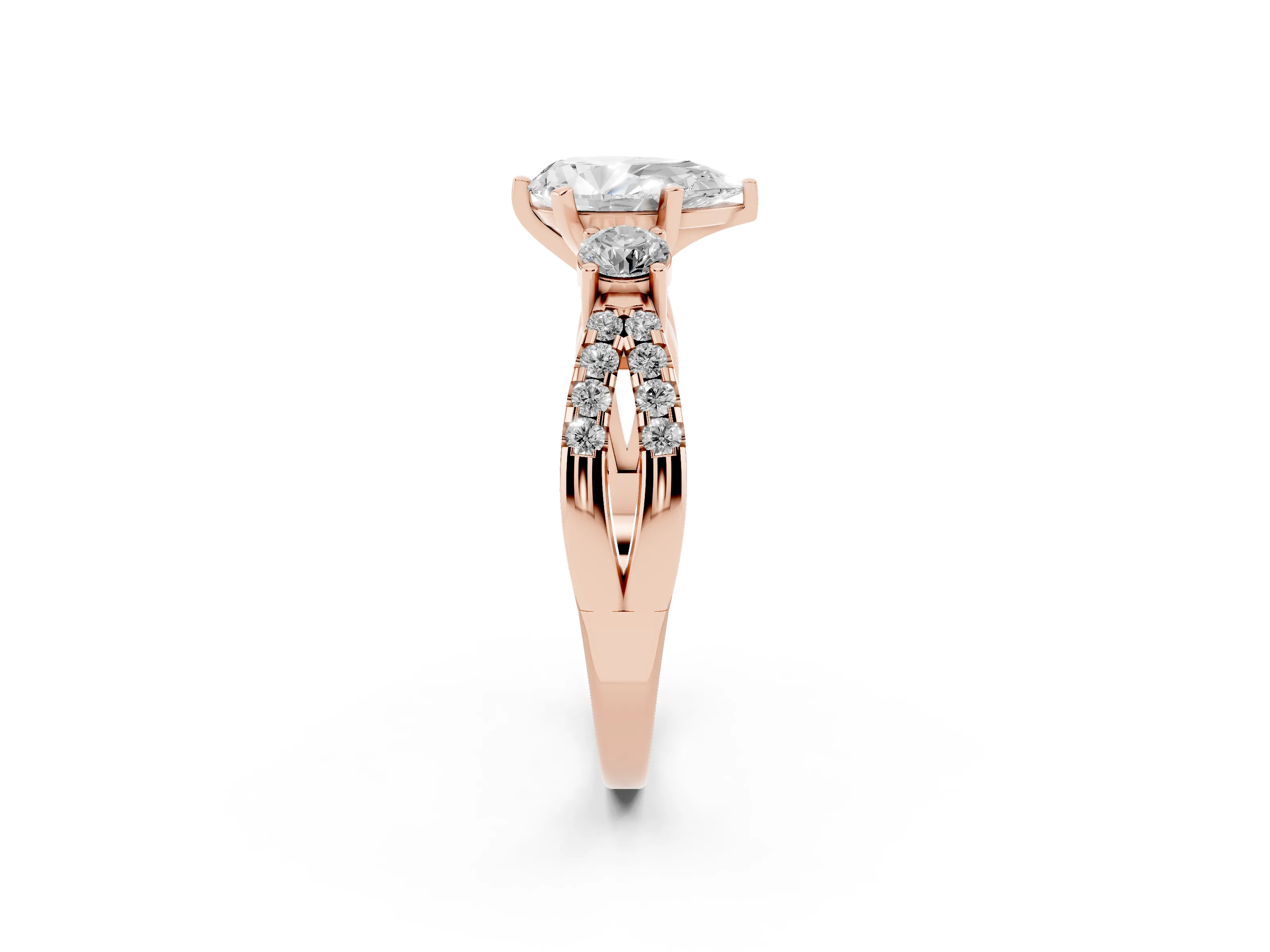 Pear Cut Diamond Three-Stone Ring Set in Rose gold with Pavé Split Shank and Prong Setting