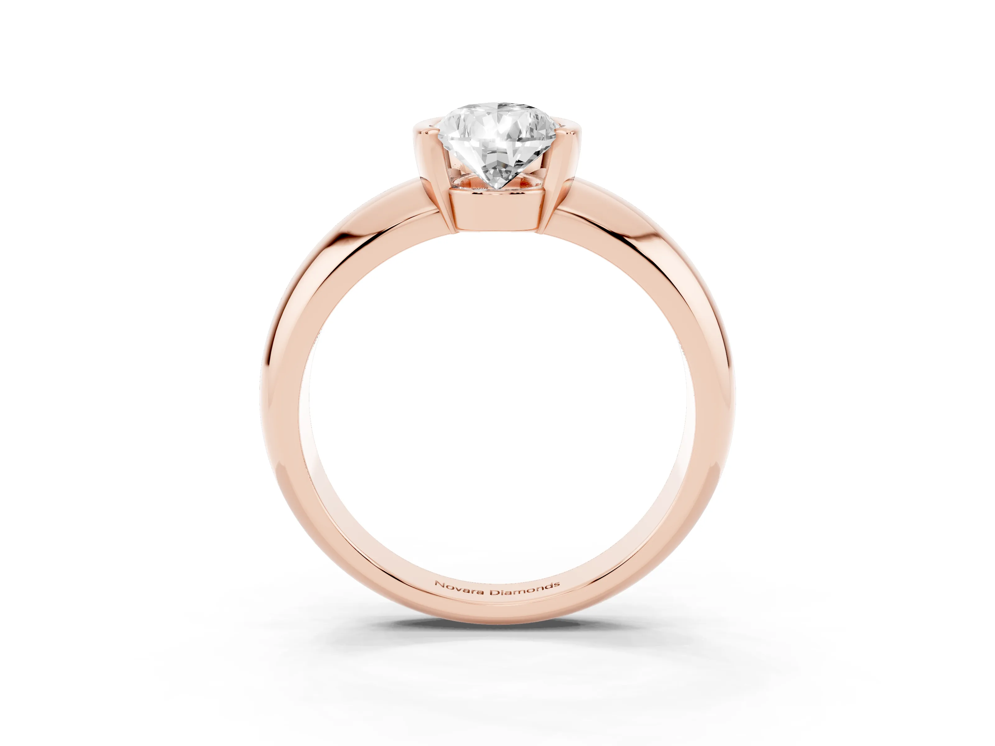 Pear Cut Diamond Solitaire Tension Set Ring Set in Rose gold with Wide Band
