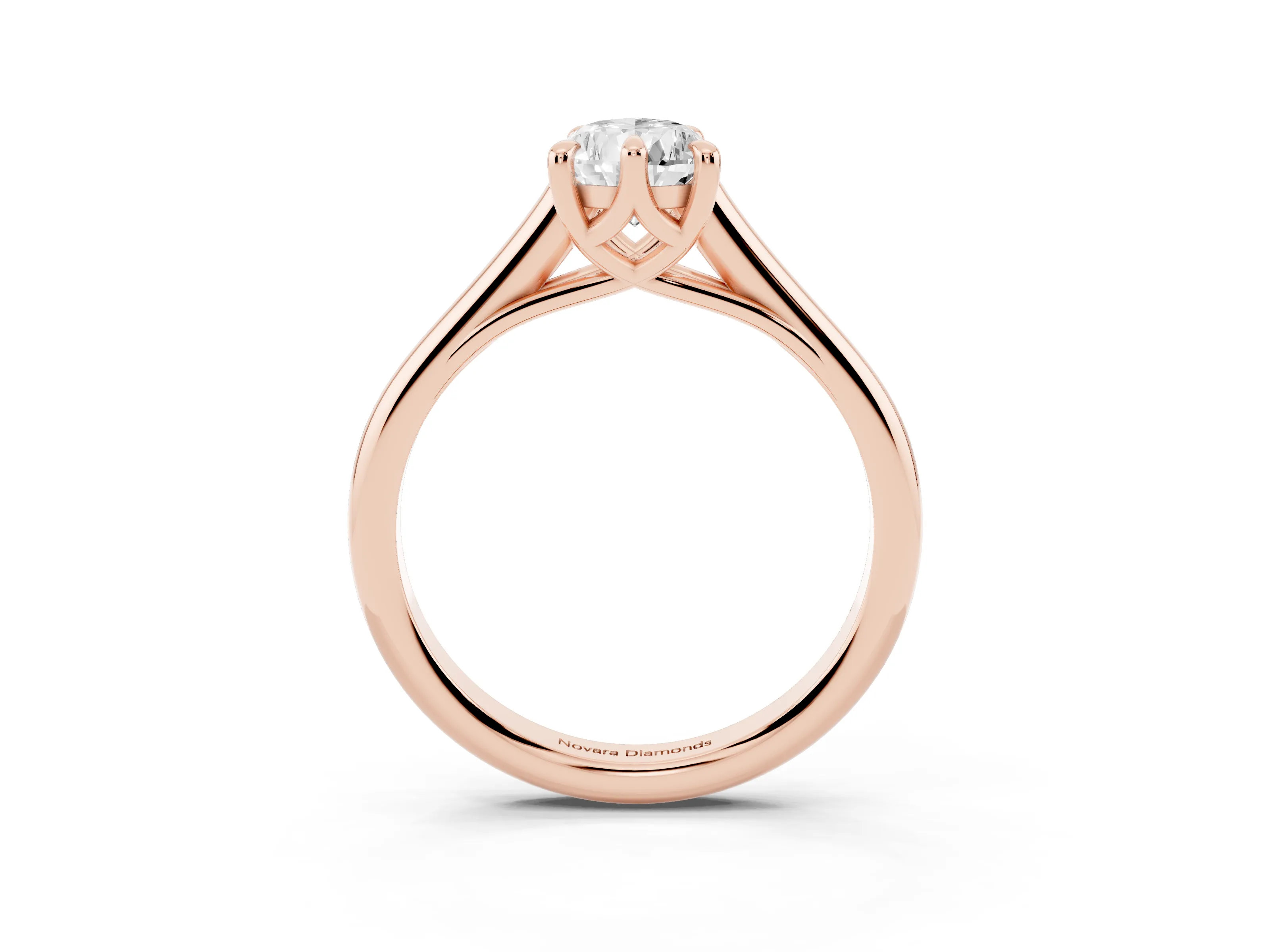 Pear Cut Diamond Solitaire Engagement Ring Set in Rose gold with Prong Setting and Plain Classic Band