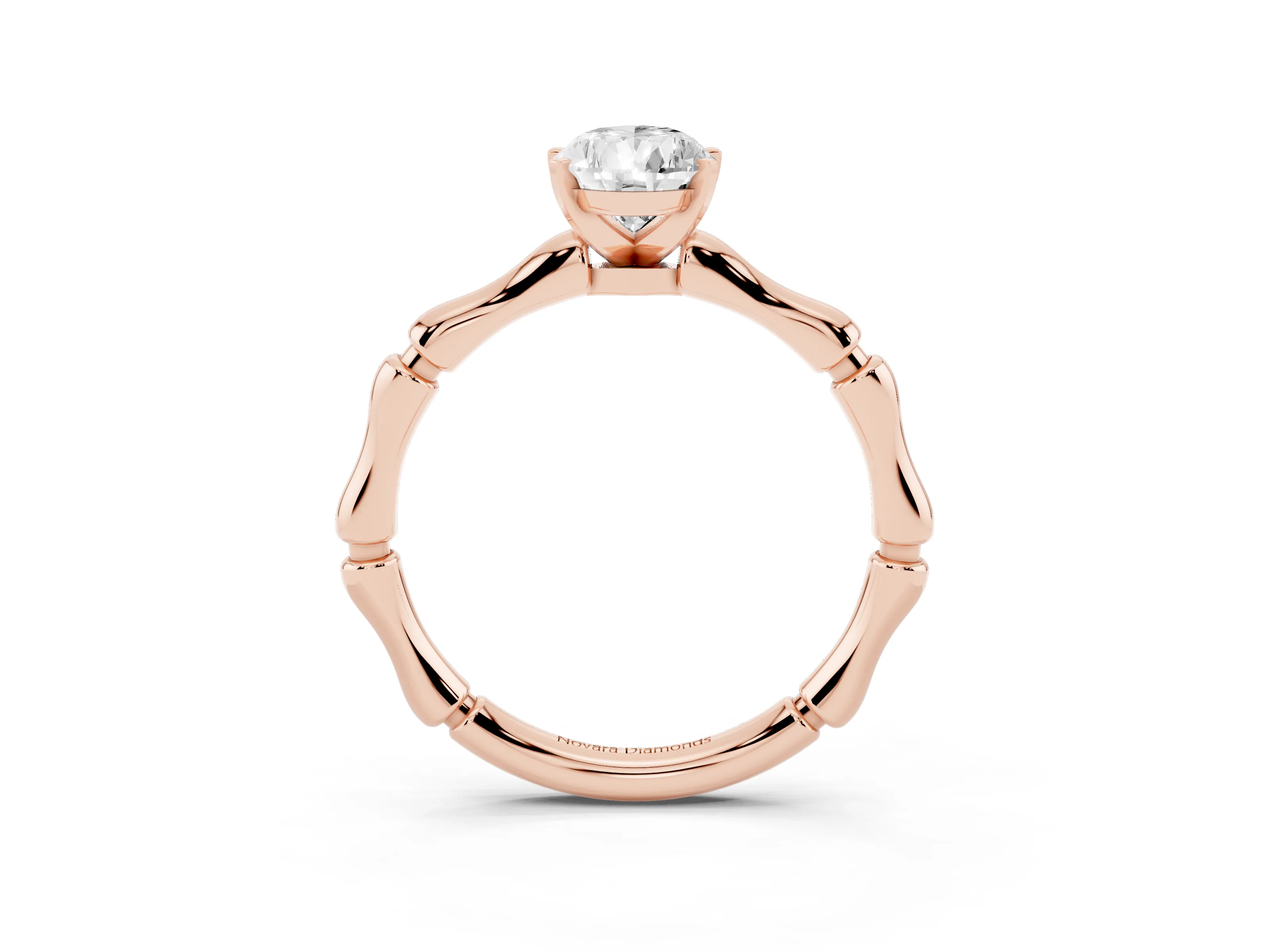 Pear Cut Diamond Solitaire Ring Set in Rose gold with Bamboo Band and Prong Setting