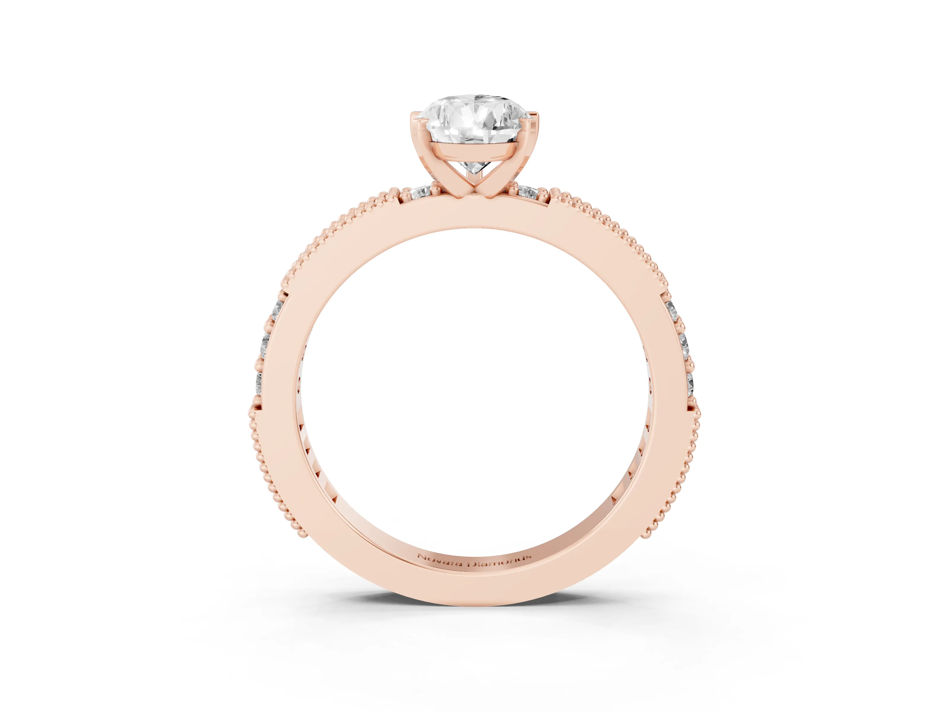 Pear Cut Diamond Solitaire Ring Set in Rose gold with Slim Pavé Band and Prong Setting