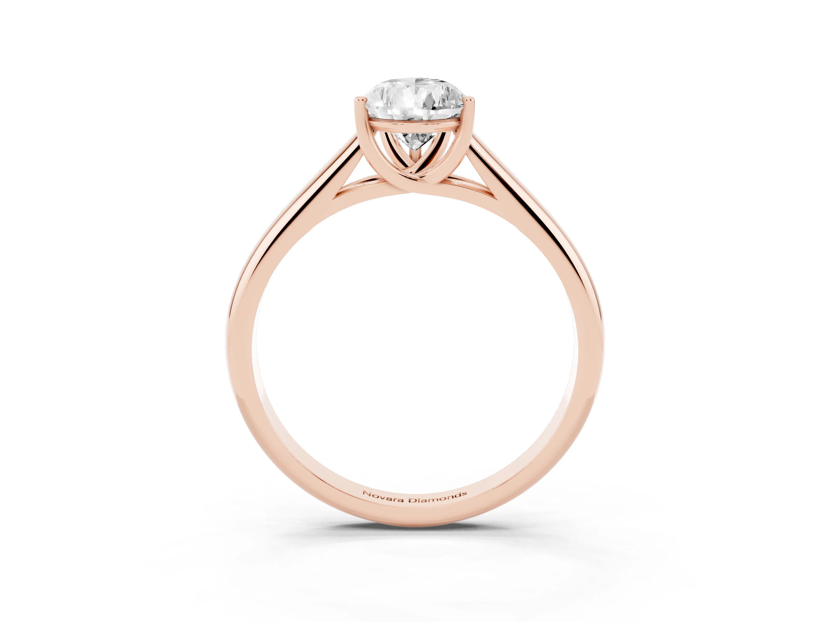 Pear Cut Diamond Solitaire Engagement Ring Set in Rose gold with Subtly Tapered Band and Prong Setting