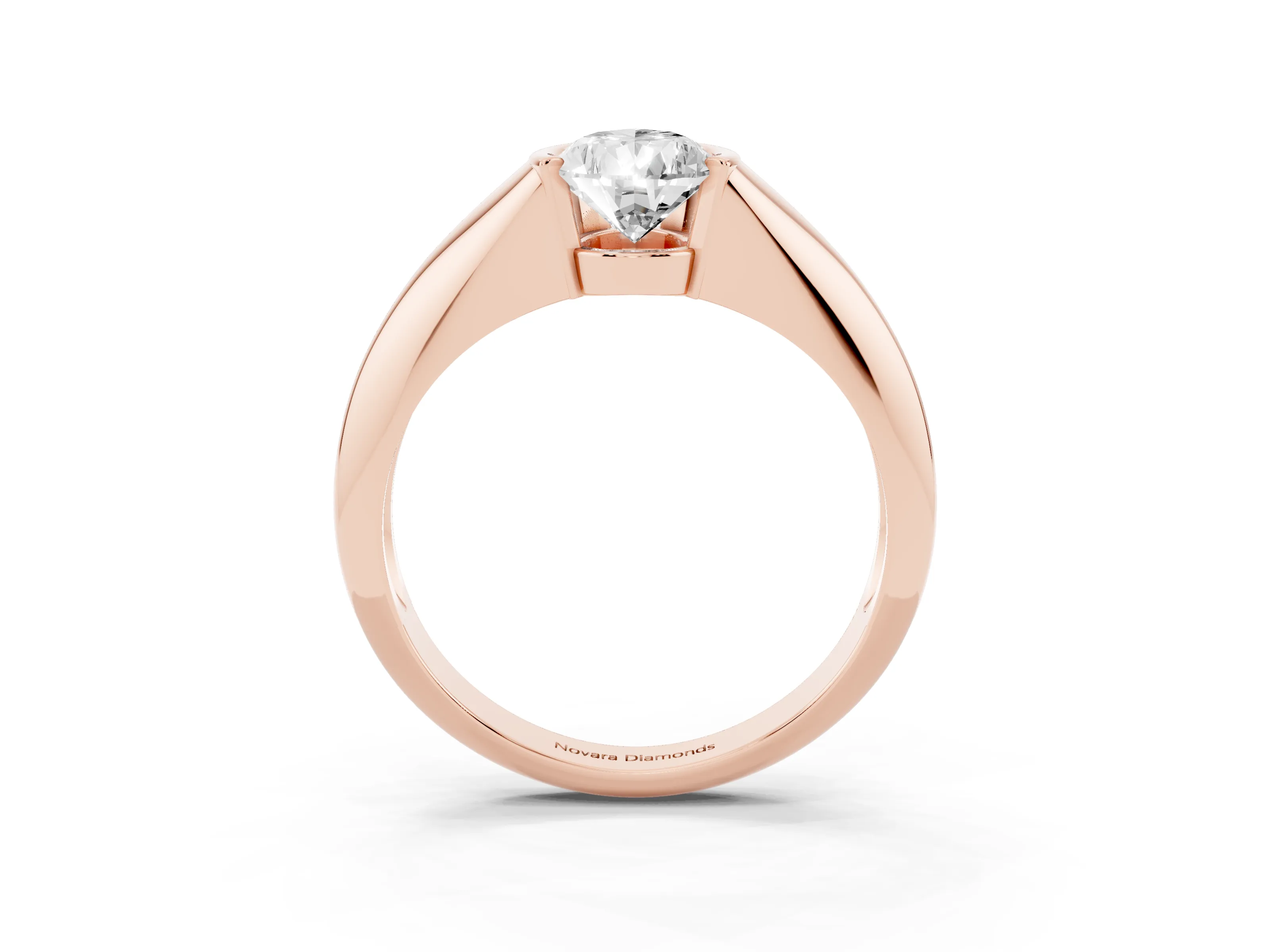 Pear Cut Diamond Solitaire Tension Set Ring Set in Rose gold