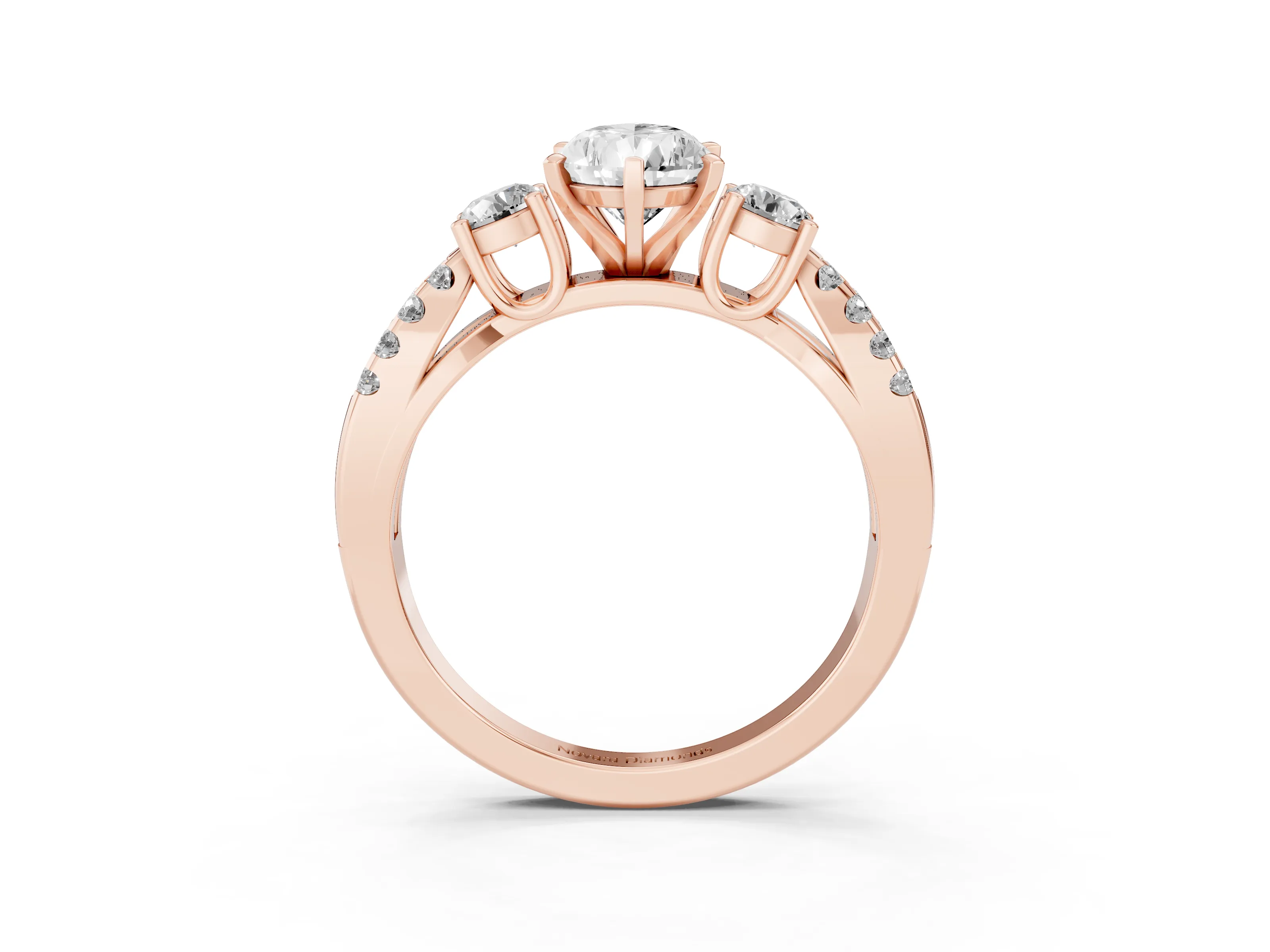 Pear Cut Diamond Three-Stone Ring Set in Rose gold with Pavé Split Shank and Prong Setting