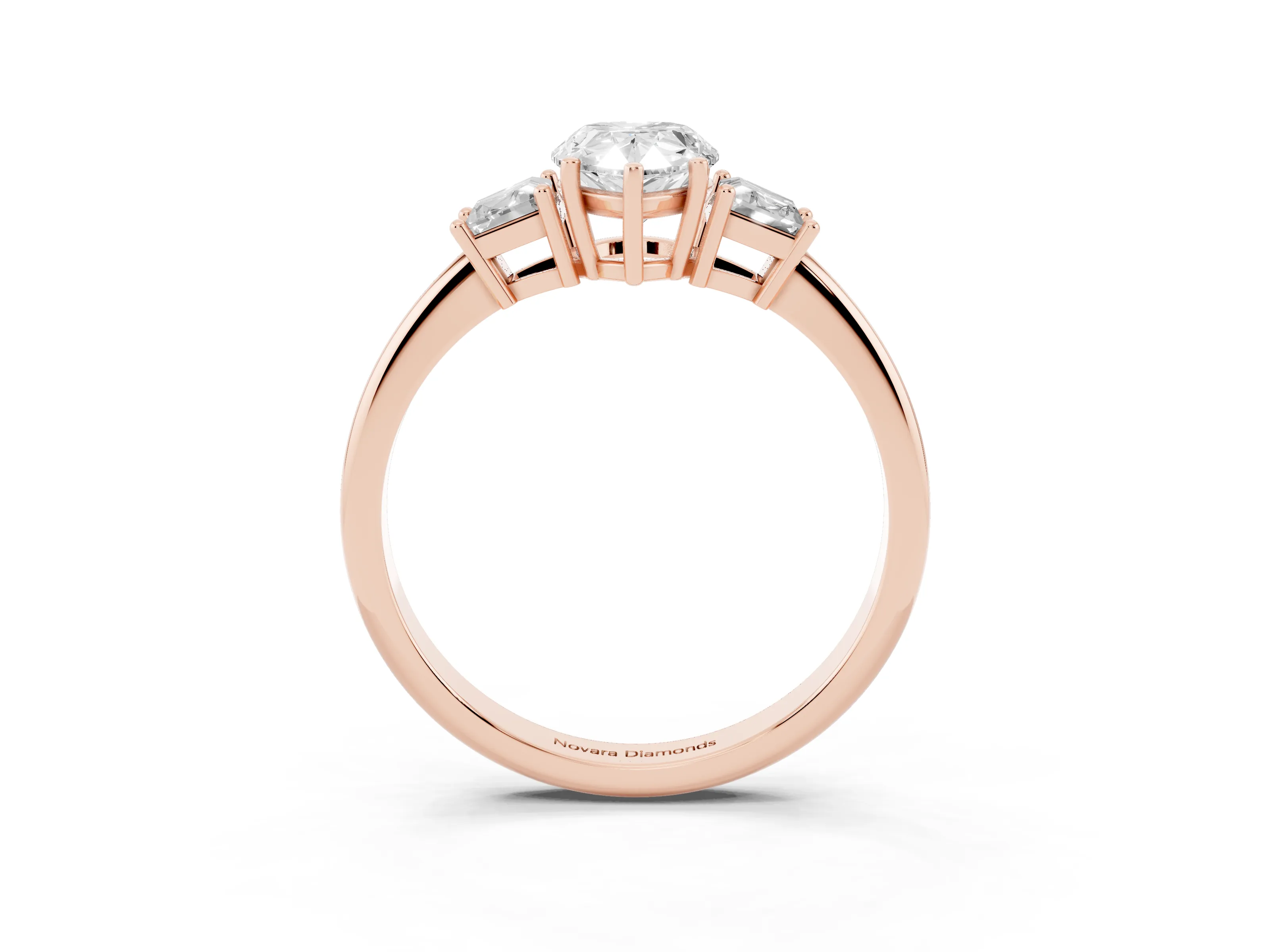 Pear Cut Diamond Three-Stone Ring Set in Rose gold with Trapezoid Side Stones and Prong Setting