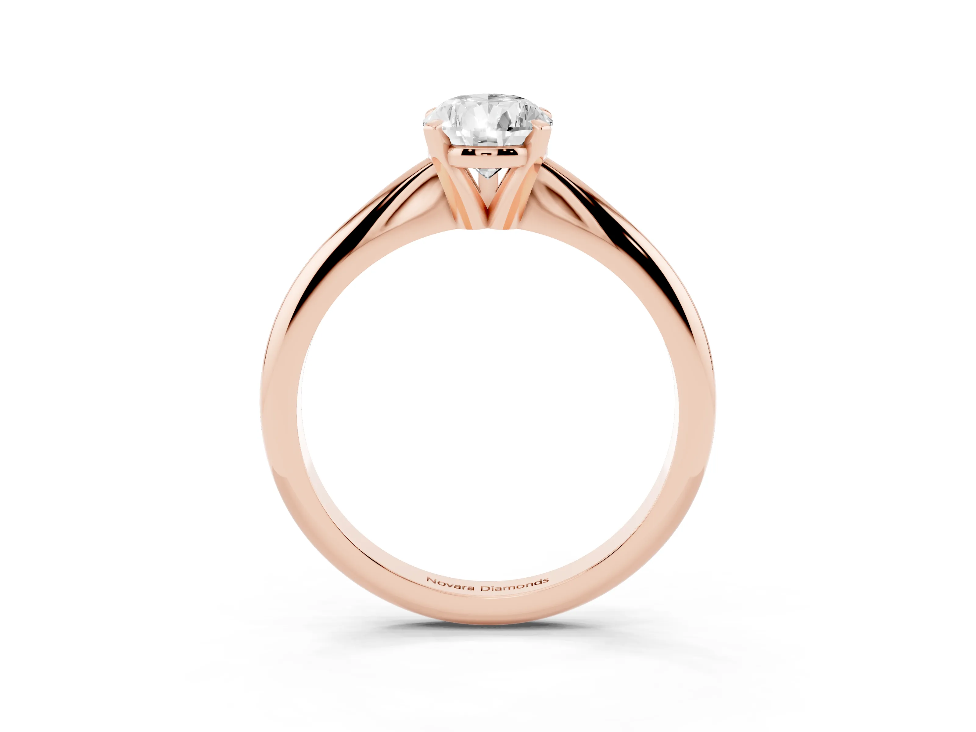 Pear Cut Diamond Solitaire Ring Set in Rose gold with Prong Setting on a Plain Round Band