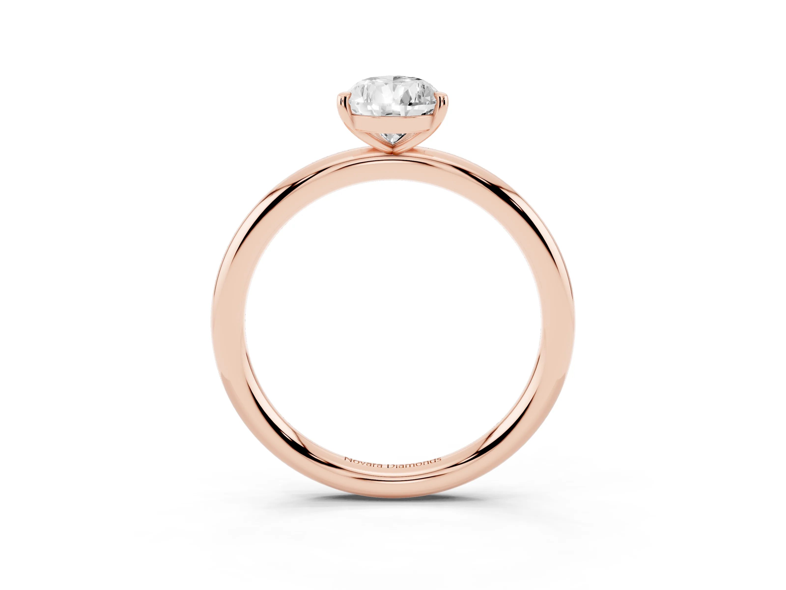 Pear Cut Diamond Solitaire Ring Set in Rose gold with Prong Setting on a Polished Plain Band