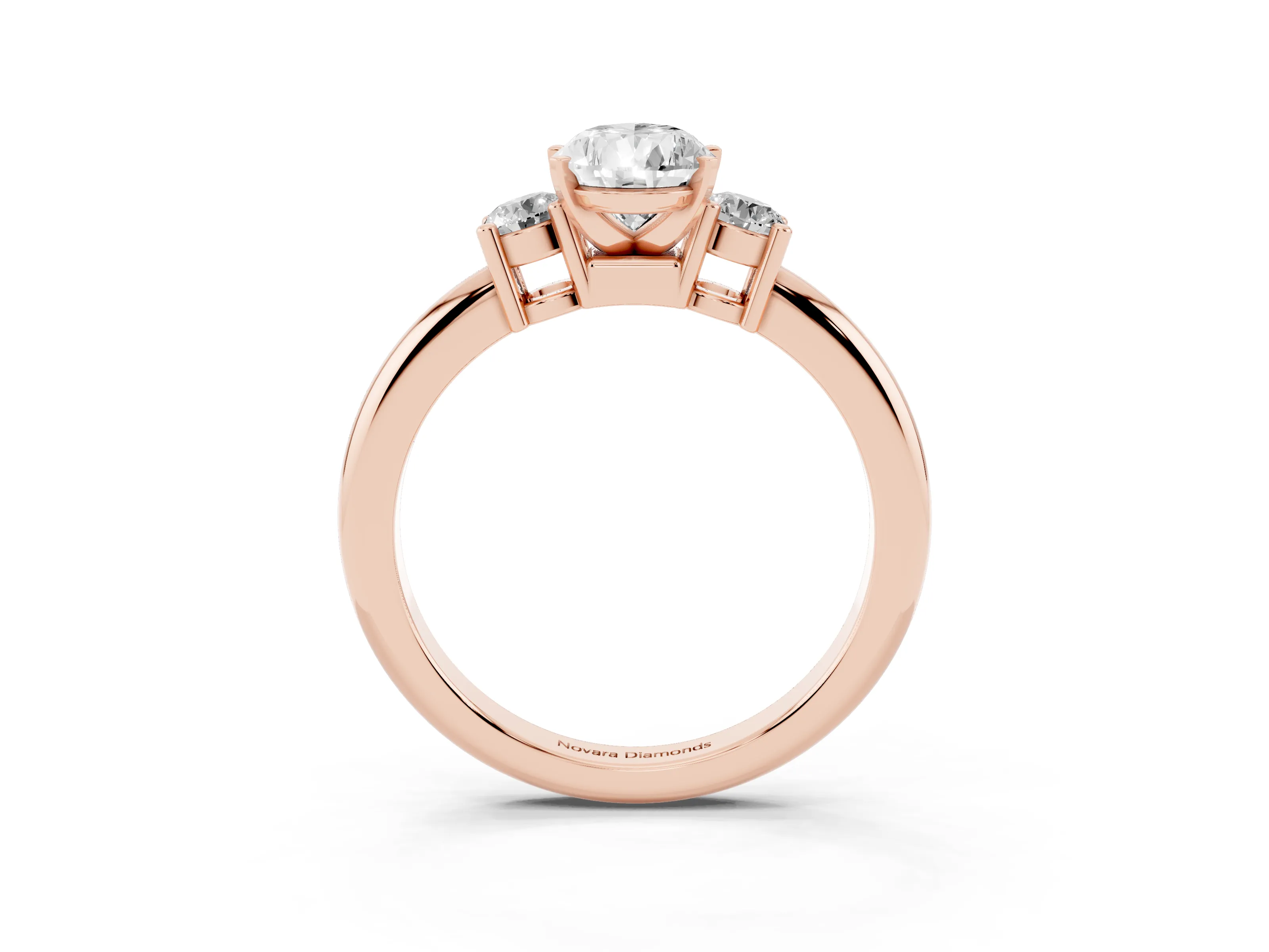 Three-Stone Pear Cut Diamond Ring Set in Rose gold with Prong Setting and Plain Band