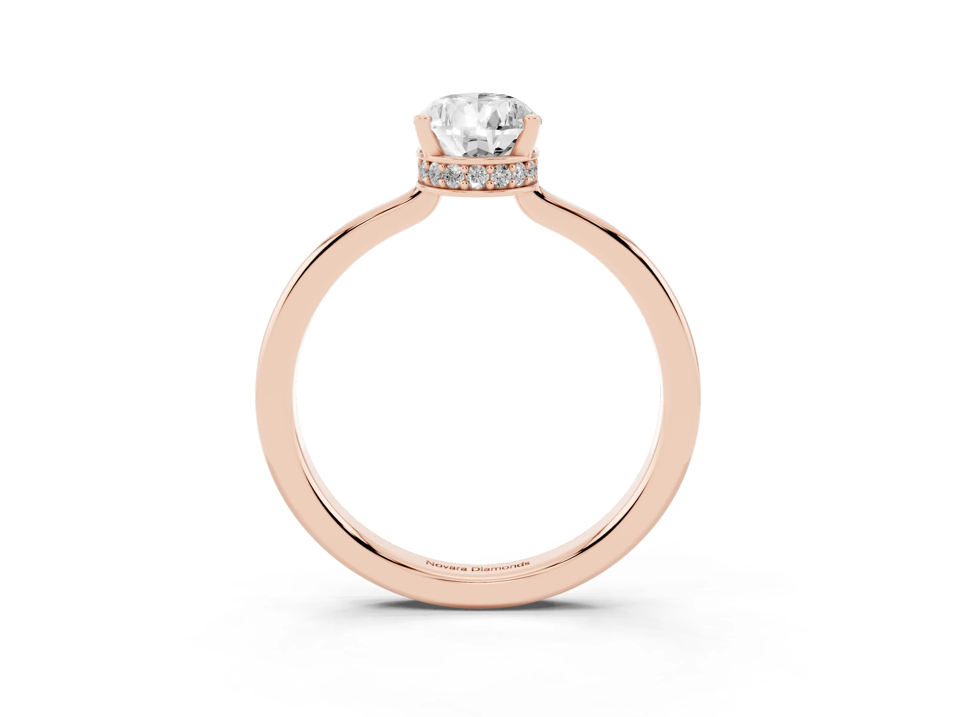 Pear Cut Diamond Solitaire Engagement Ring Set in Rose gold with Prong Setting on a Plain Band