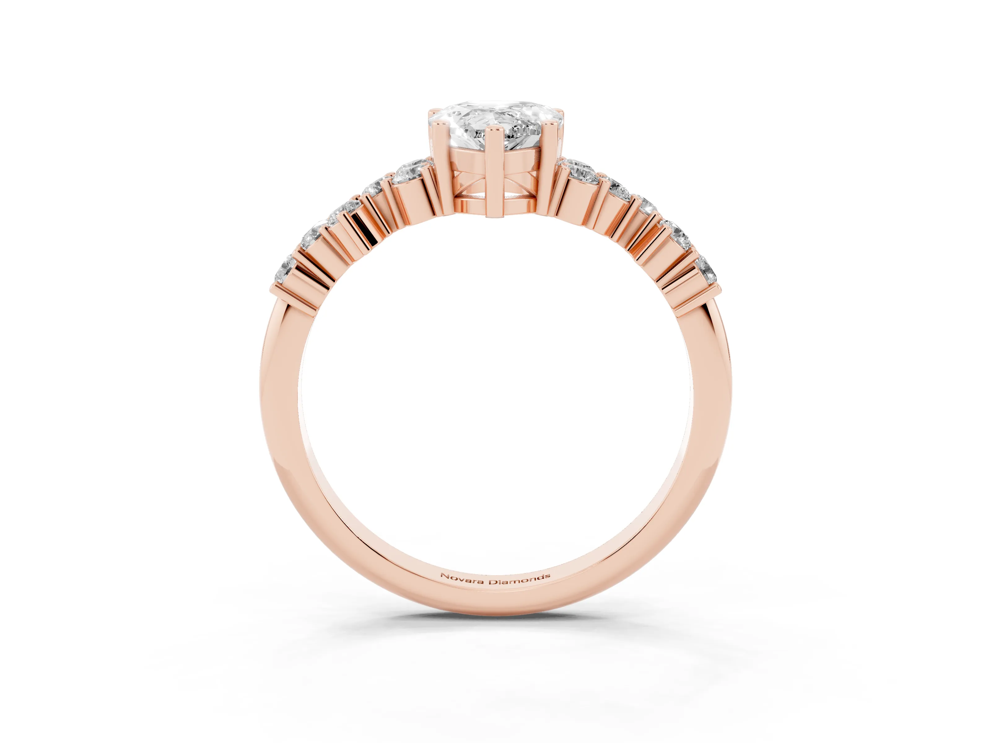 Pear Cut Diamond Ring Set in Rose gold with Scattered Round Accents
