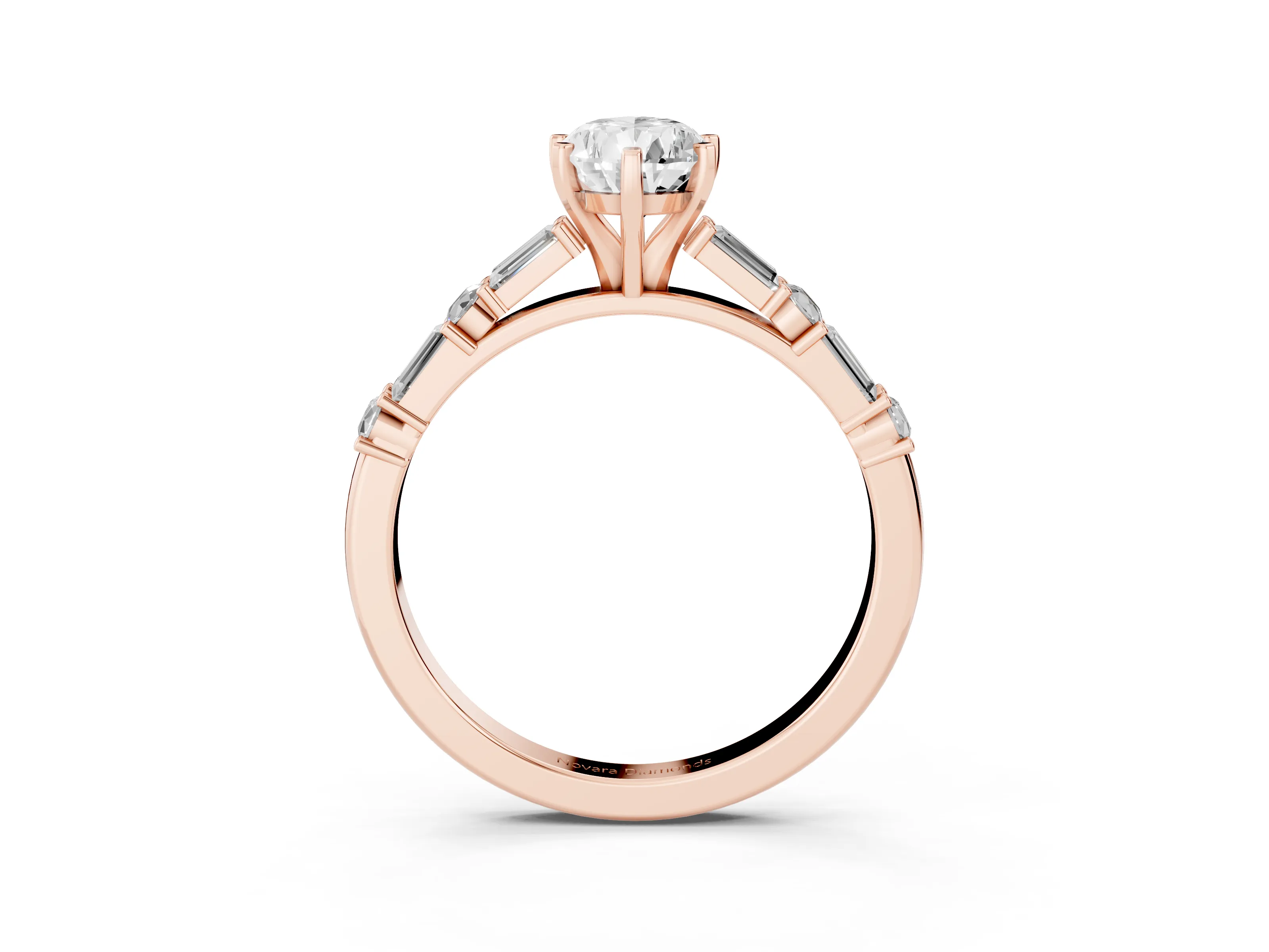 Pear Cut Diamond Solitaire Set in Rose gold with Side Baguettes and Channel Set Band