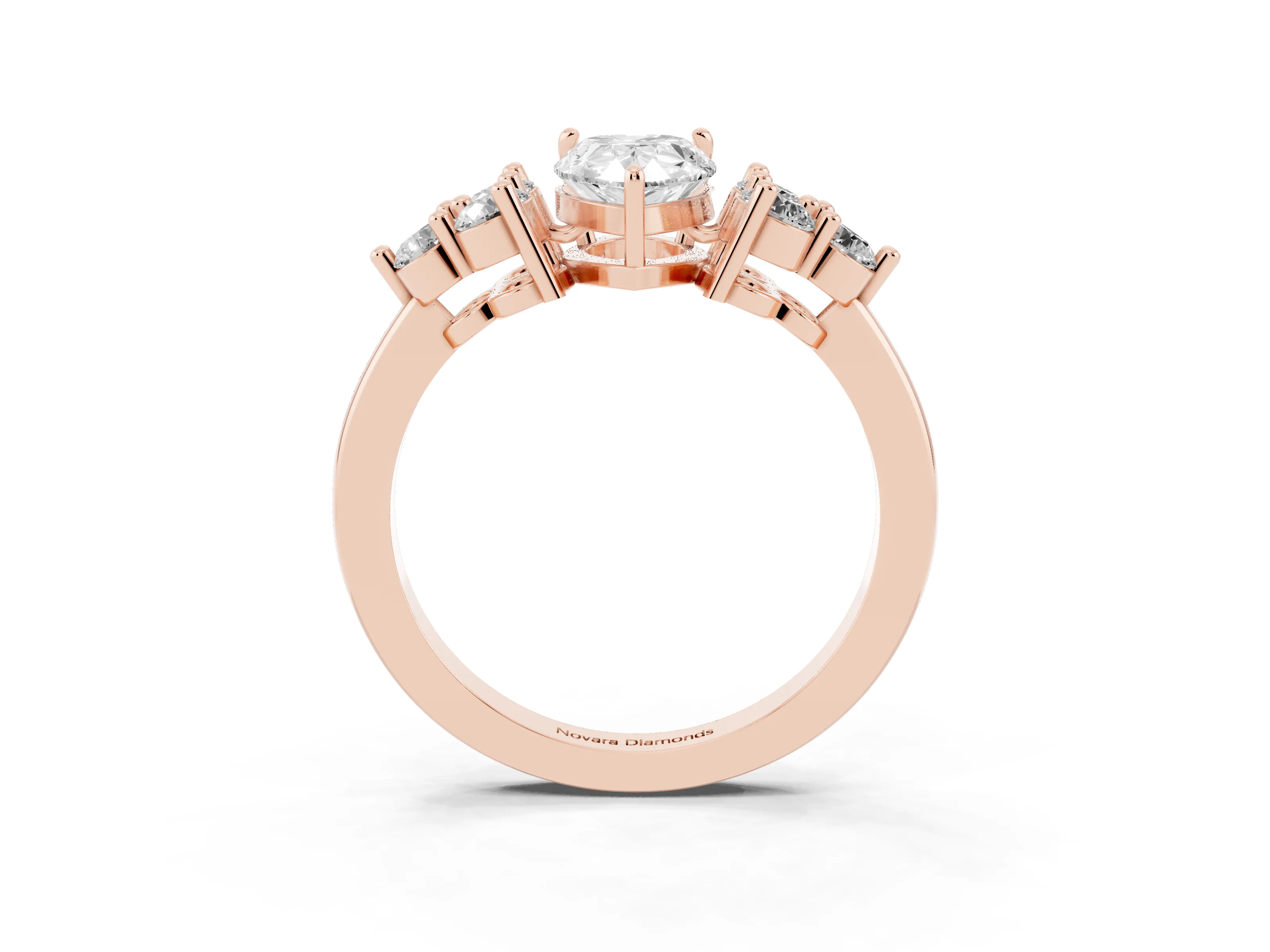 Pear Cut Diamond Solitaire Ring Set in Rose gold with Cluster Accents on Each Side