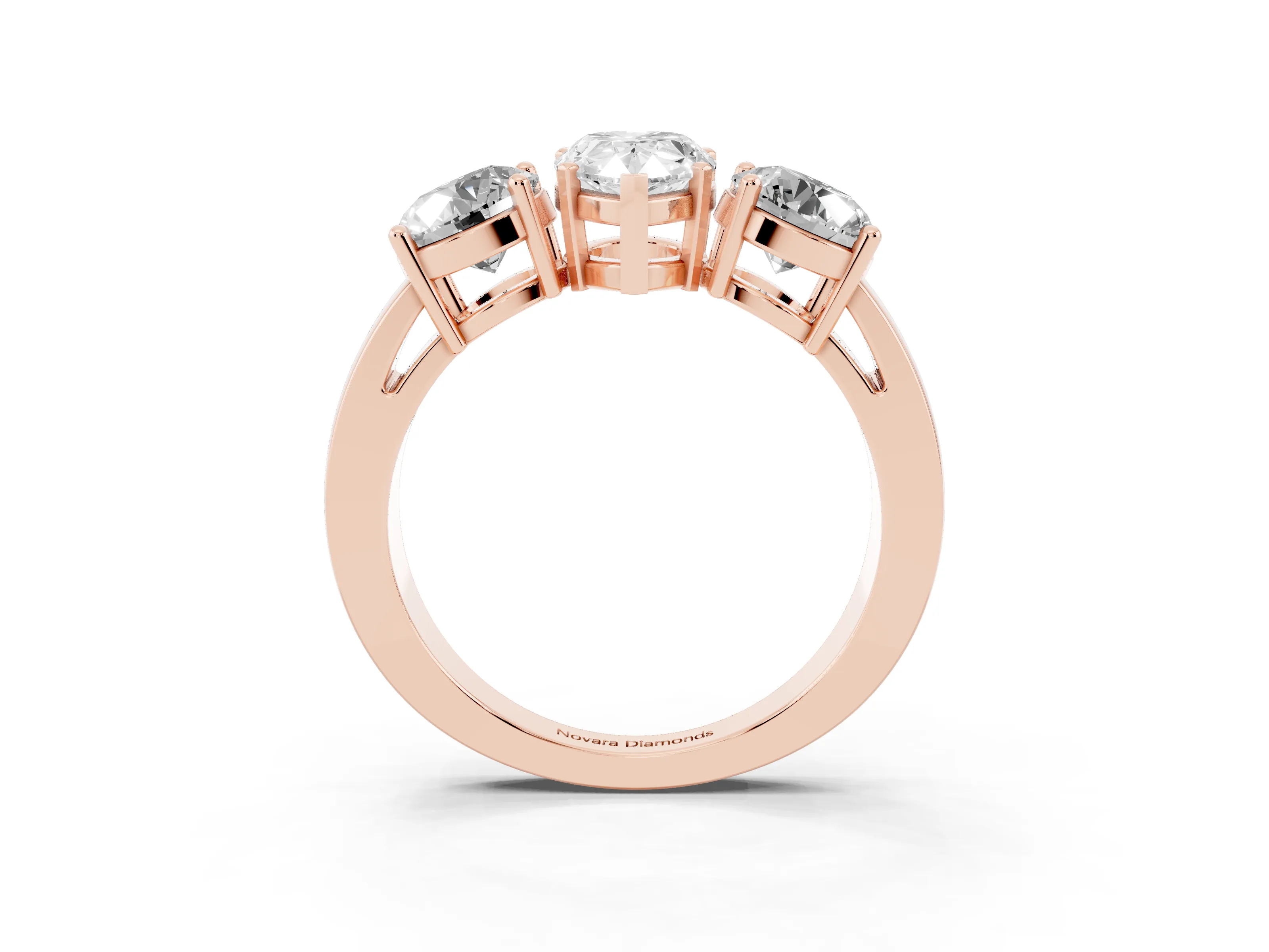 Pear Cut Diamond Three-Stone Ring Set in Rose gold with Round Side Stones and Classic Band