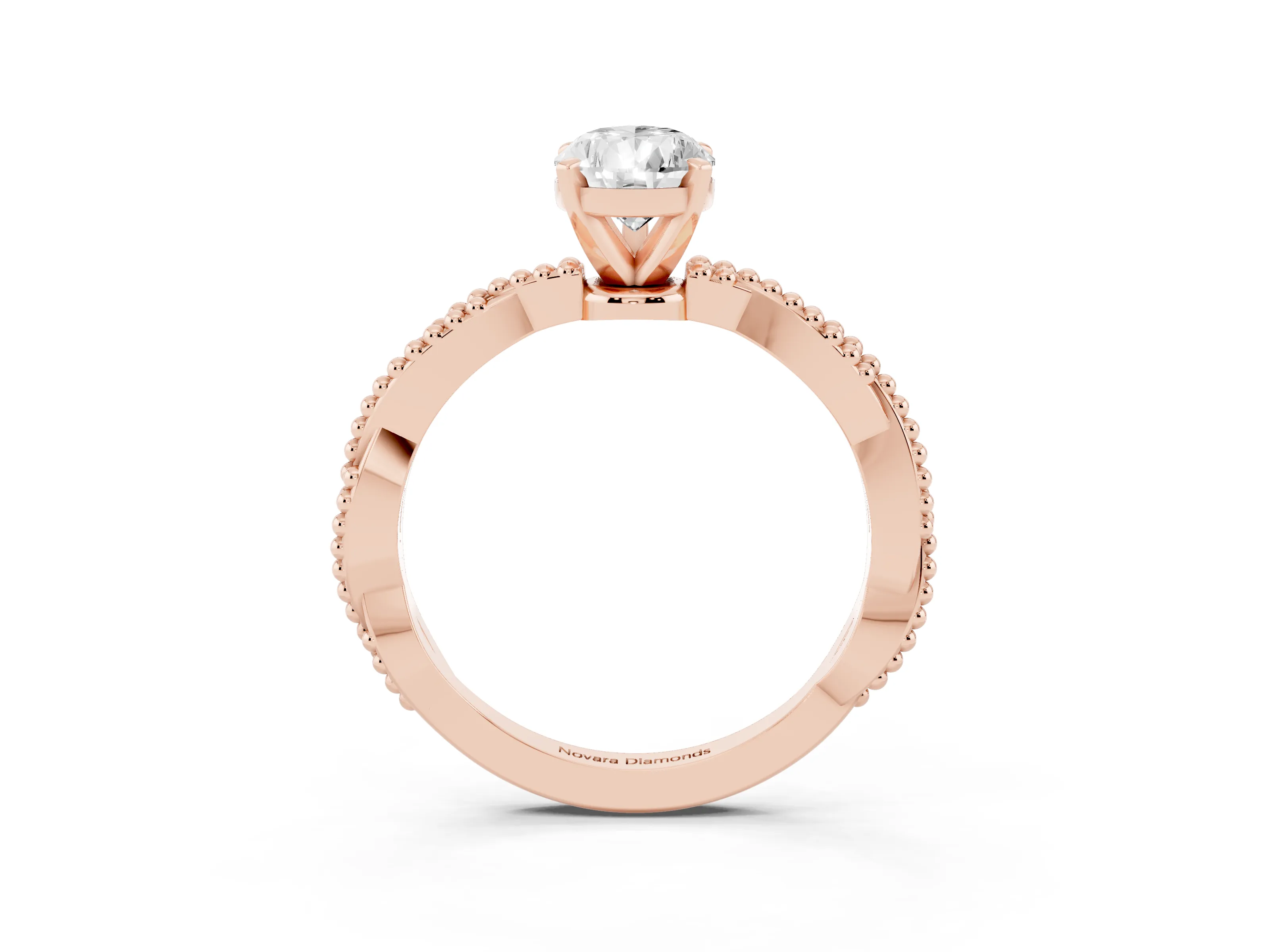 Pear Cut Diamond Solitaire Ring Set in Rose gold with Twisted Band and Bead Prong Setting