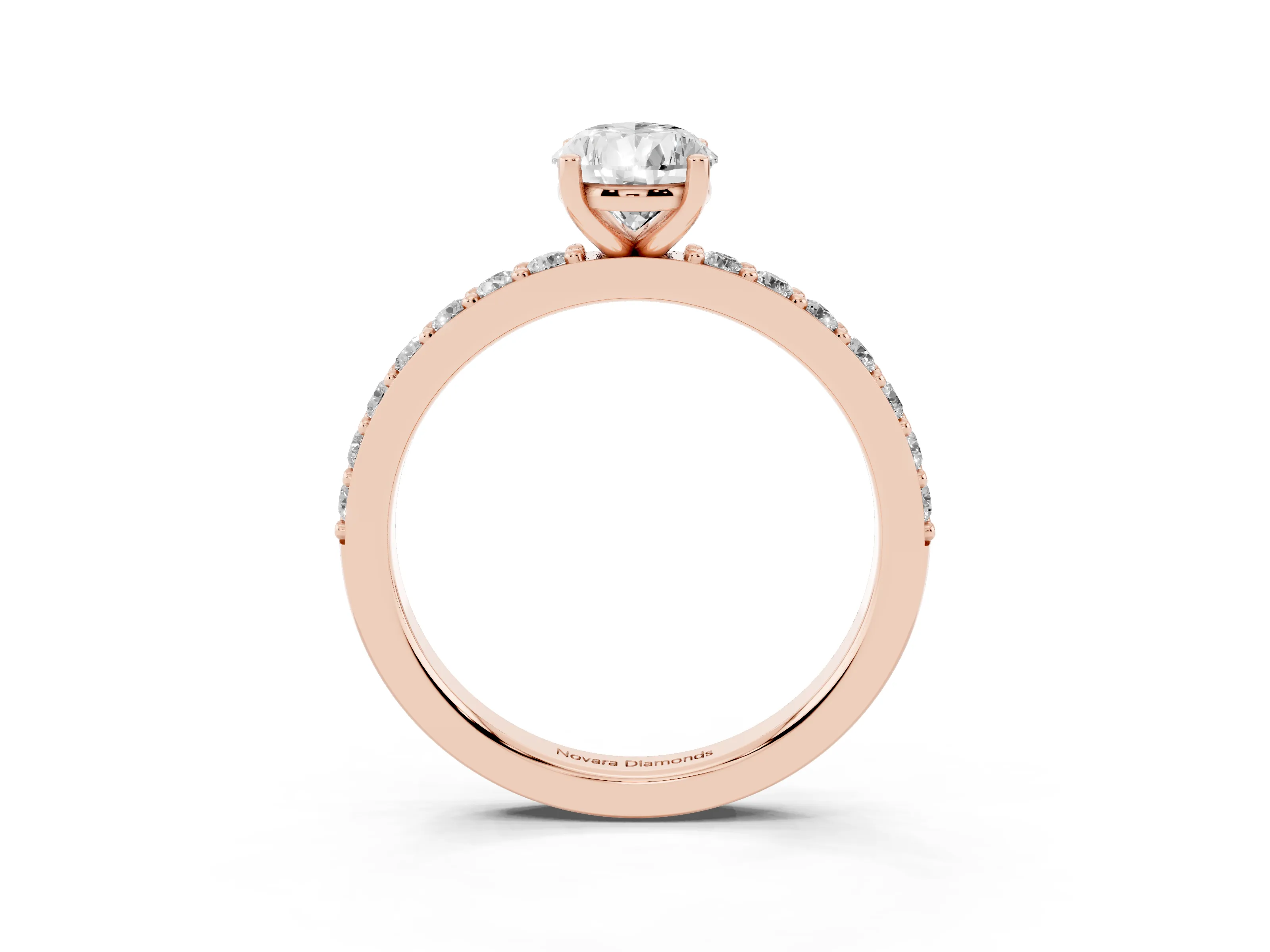 Pear Cut Diamond Solitaire Set in Rose gold with Round Pavé Band and Prong Setting