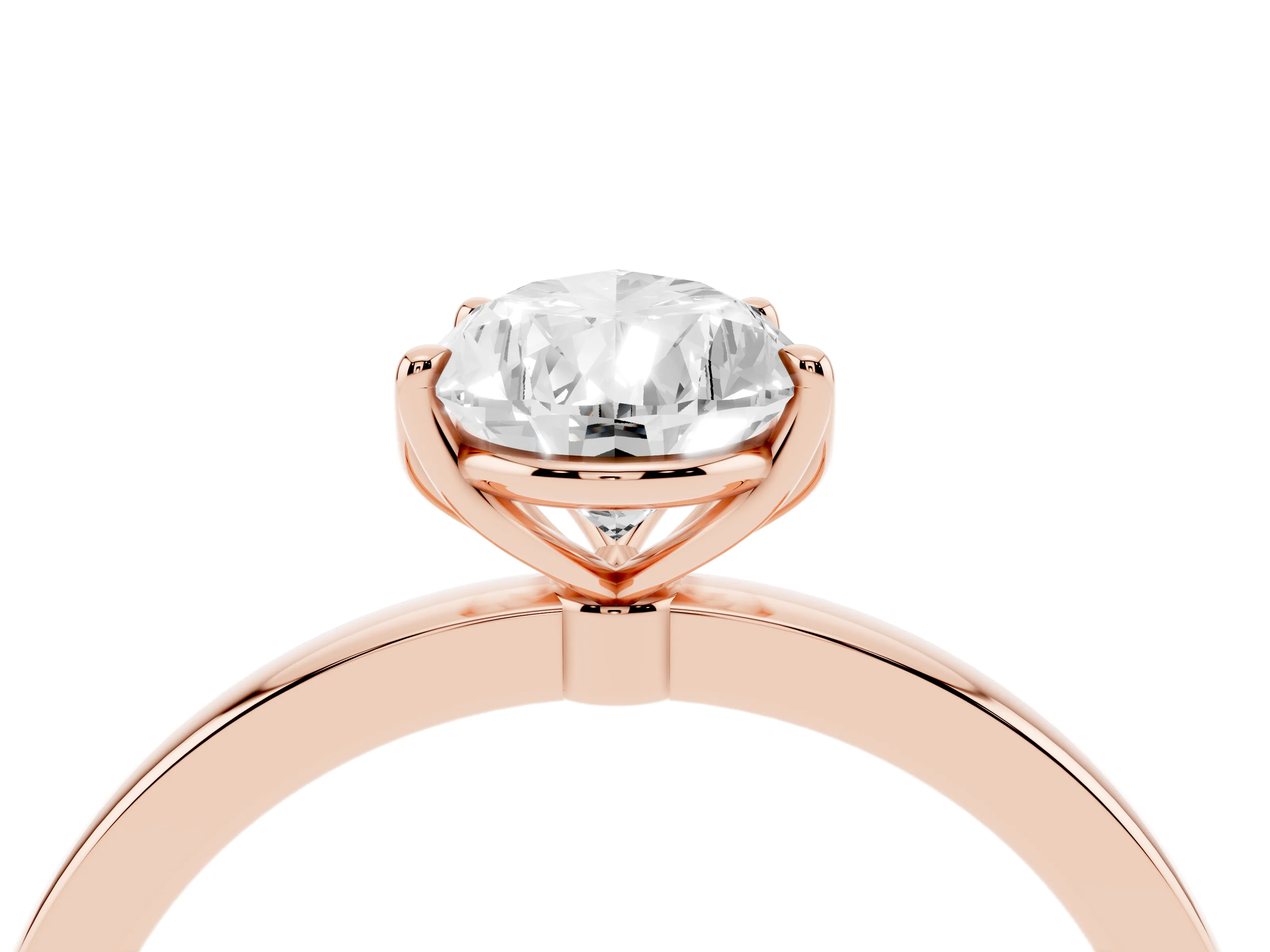 Pear Cut Diamond Solitaire Ring Set in Rose gold with Prong Setting and Thin Polished Band