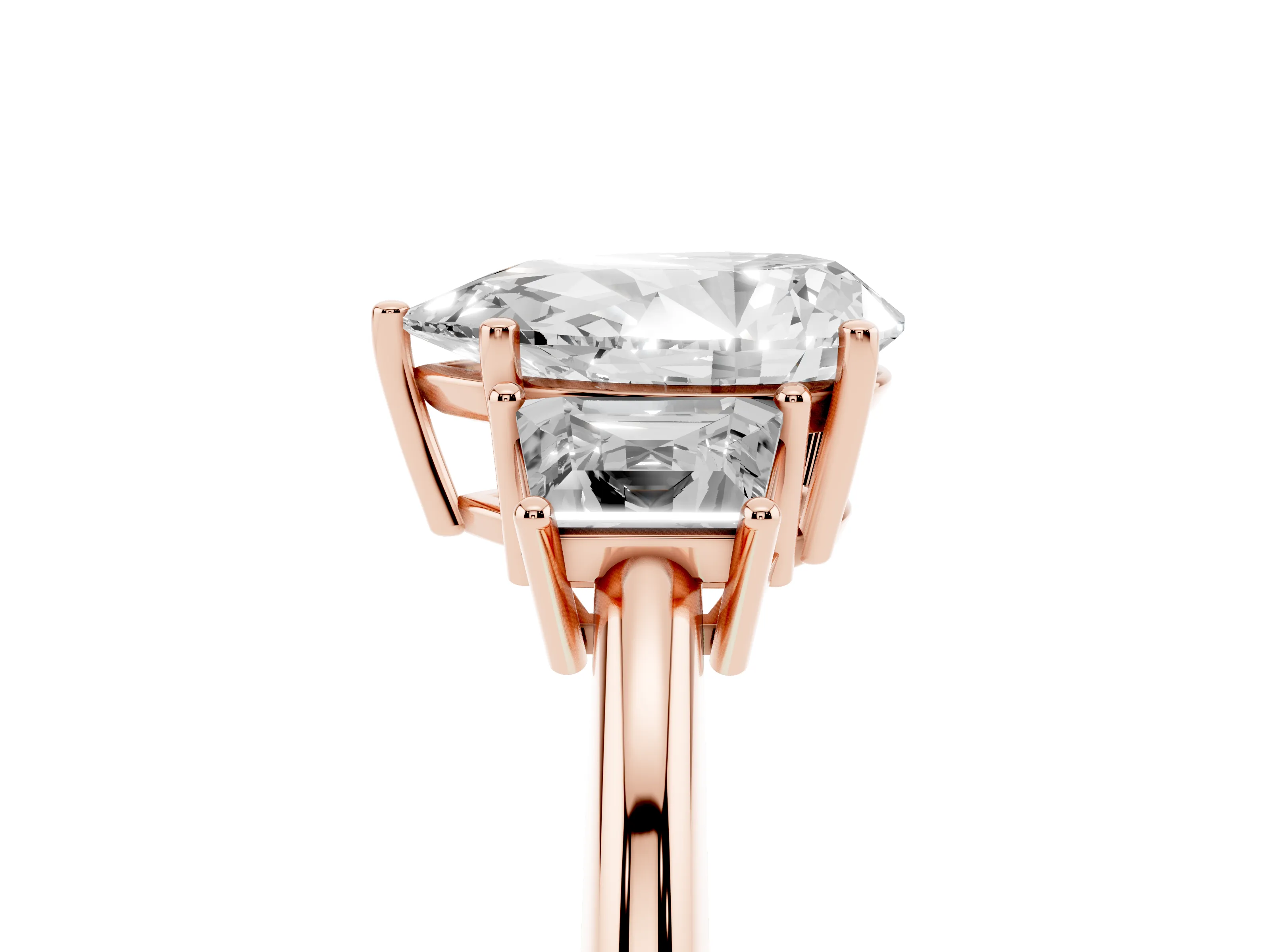 Pear Cut Diamond Three-Stone Ring Set in Rose gold with Trapezoid Side Stones and Prong Setting