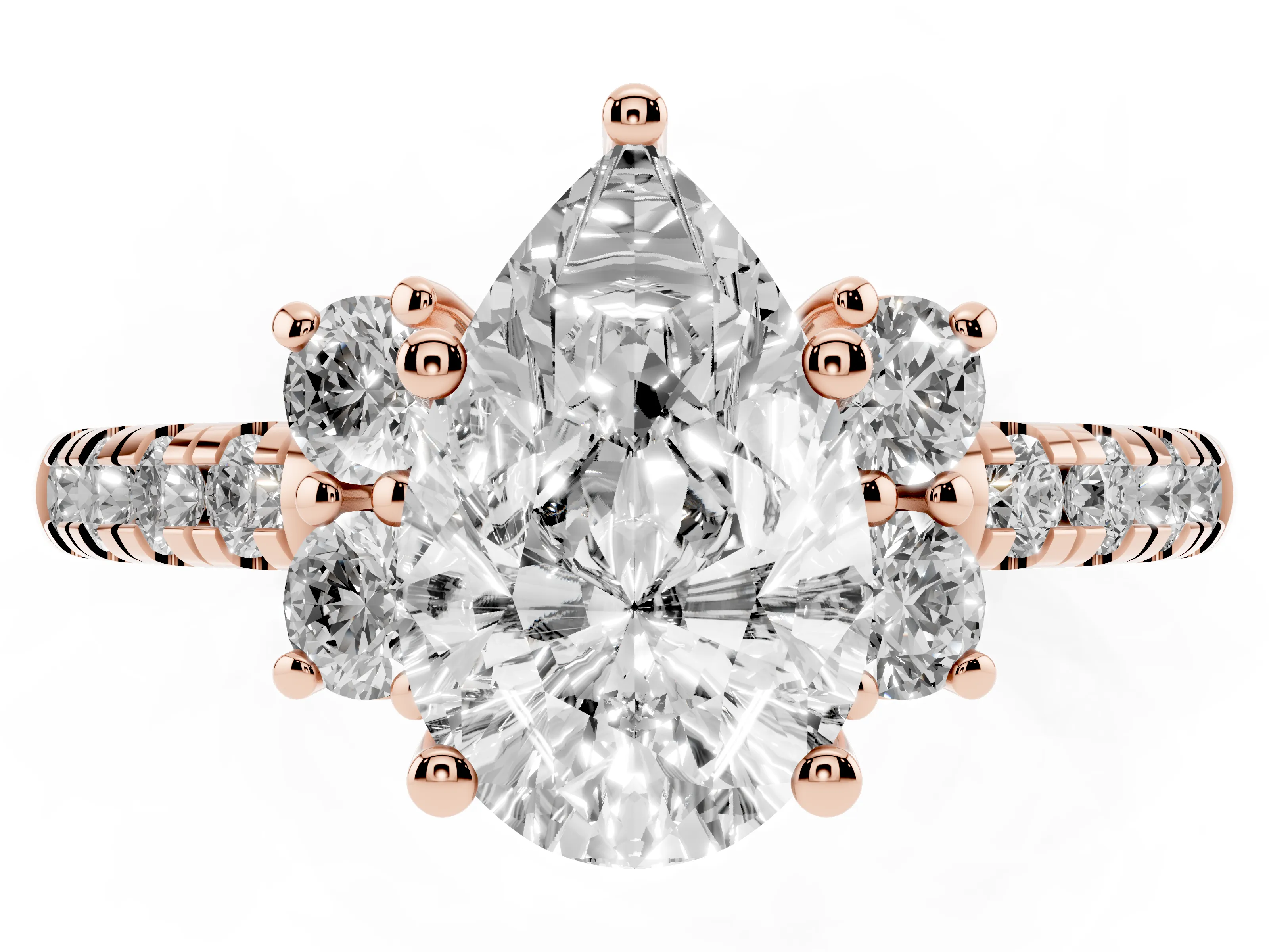 Pear Cut Diamond Three-Stone Pavé Ring Set in Rose gold with Prong Setting