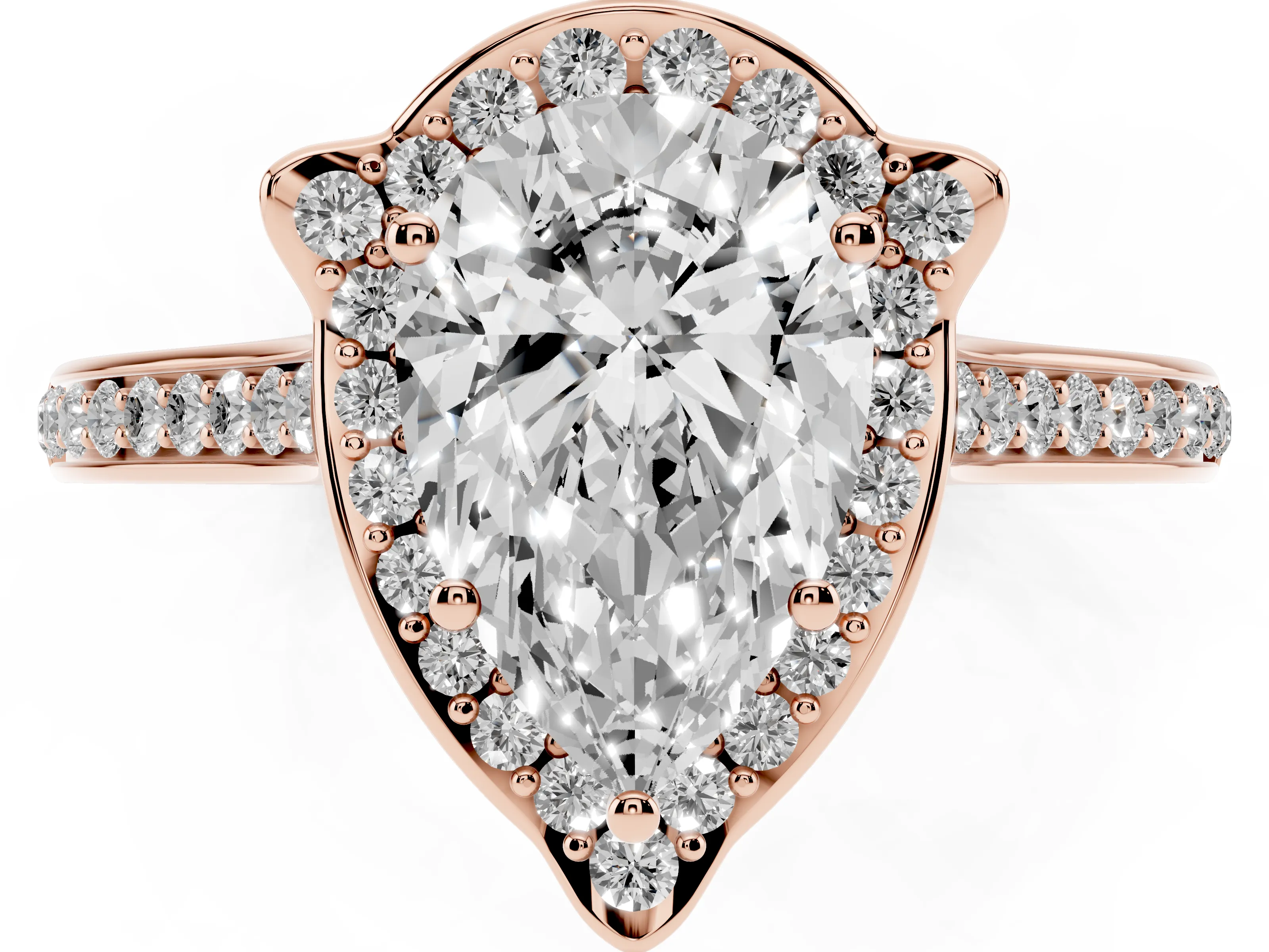 Pear Cut Diamond Halo Ring Set in Rose gold with Pavé-Lined Shoulders and Prong Setting