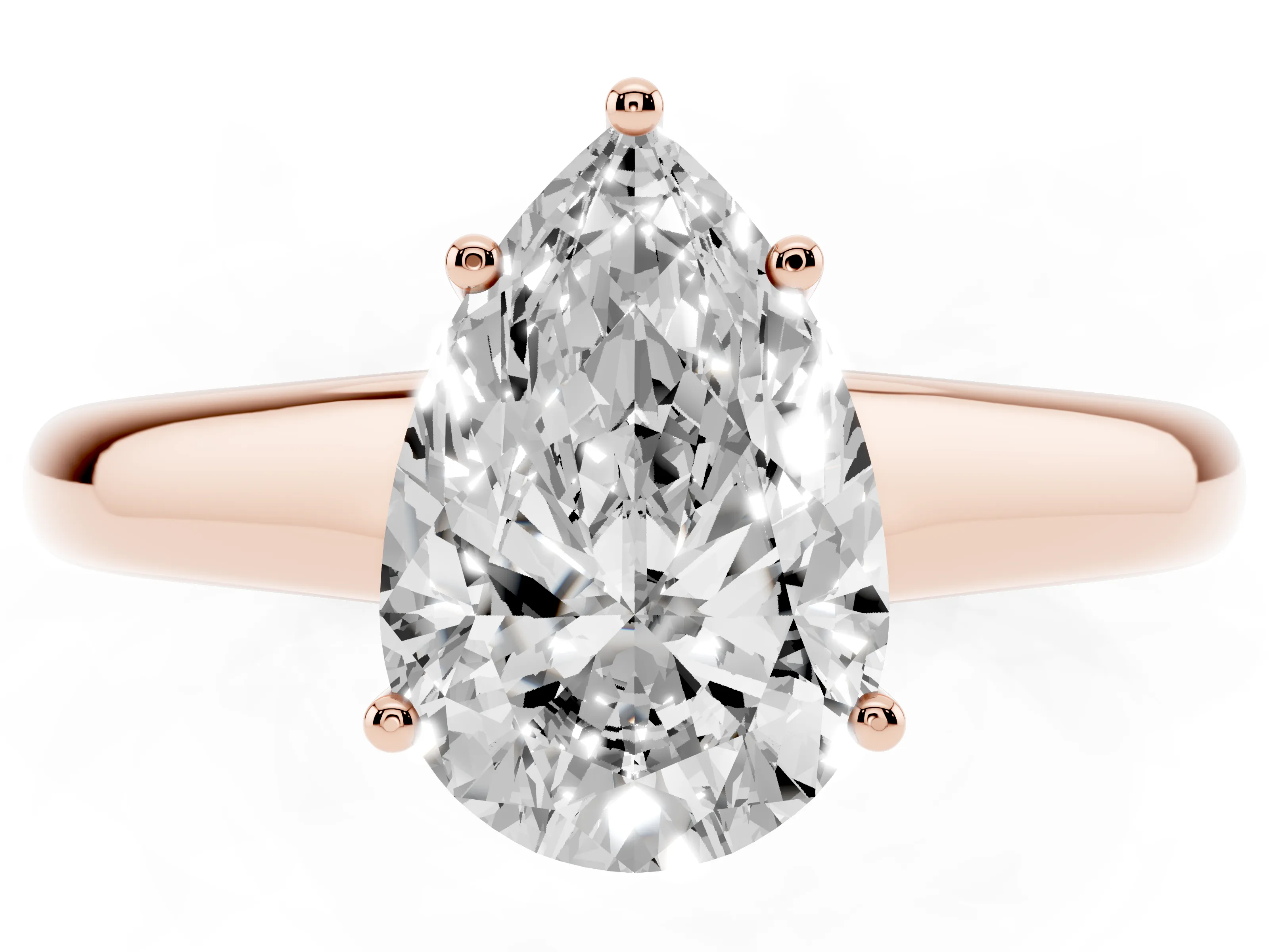 Pear Cut Diamond Solitaire Engagement Ring Set in Rose gold with Subtly Tapered Band and Prong Setting