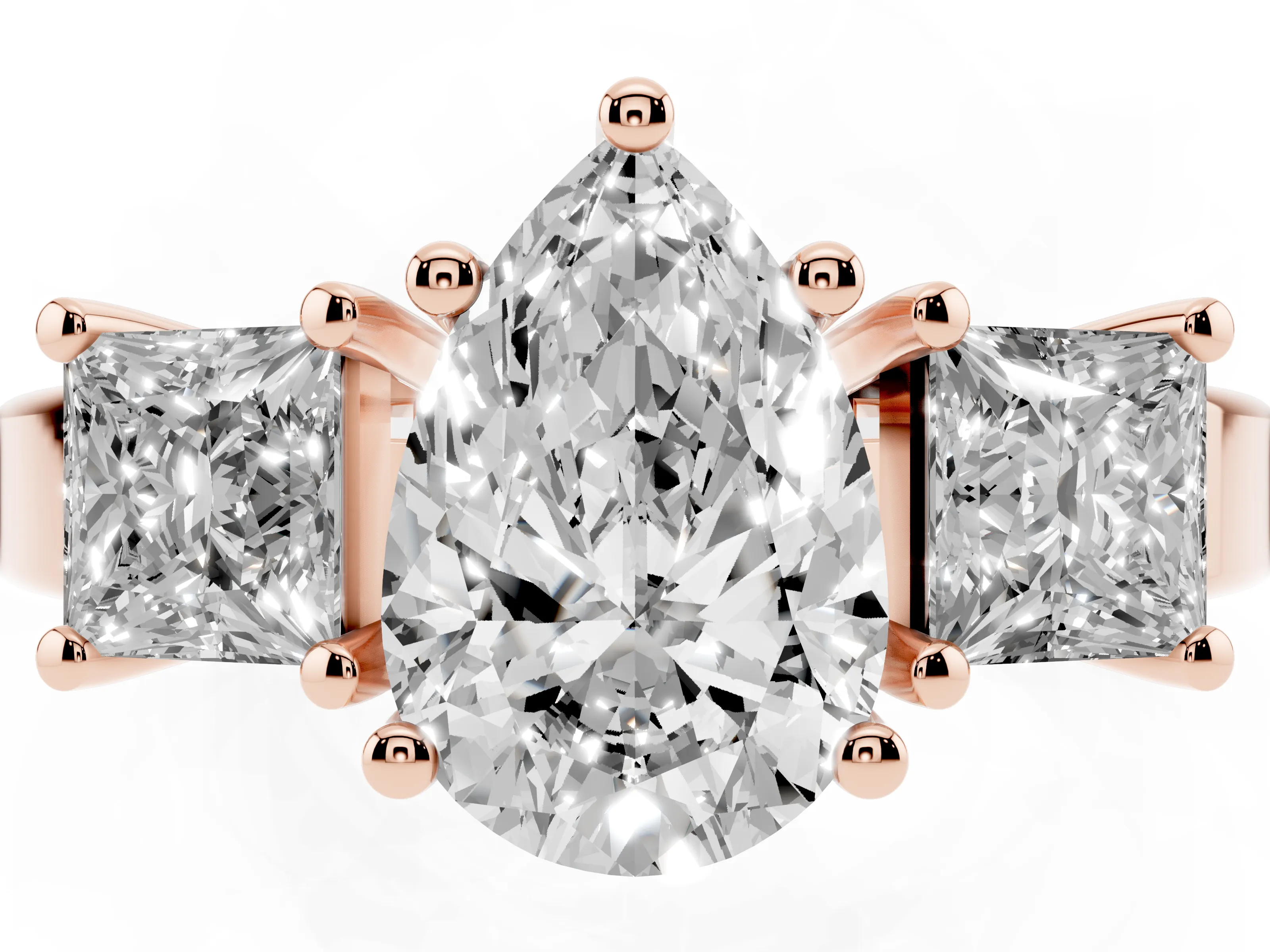 Three-Stone Pear Cut Diamond Solitaire Ring Set in Rose gold with Prong Setting