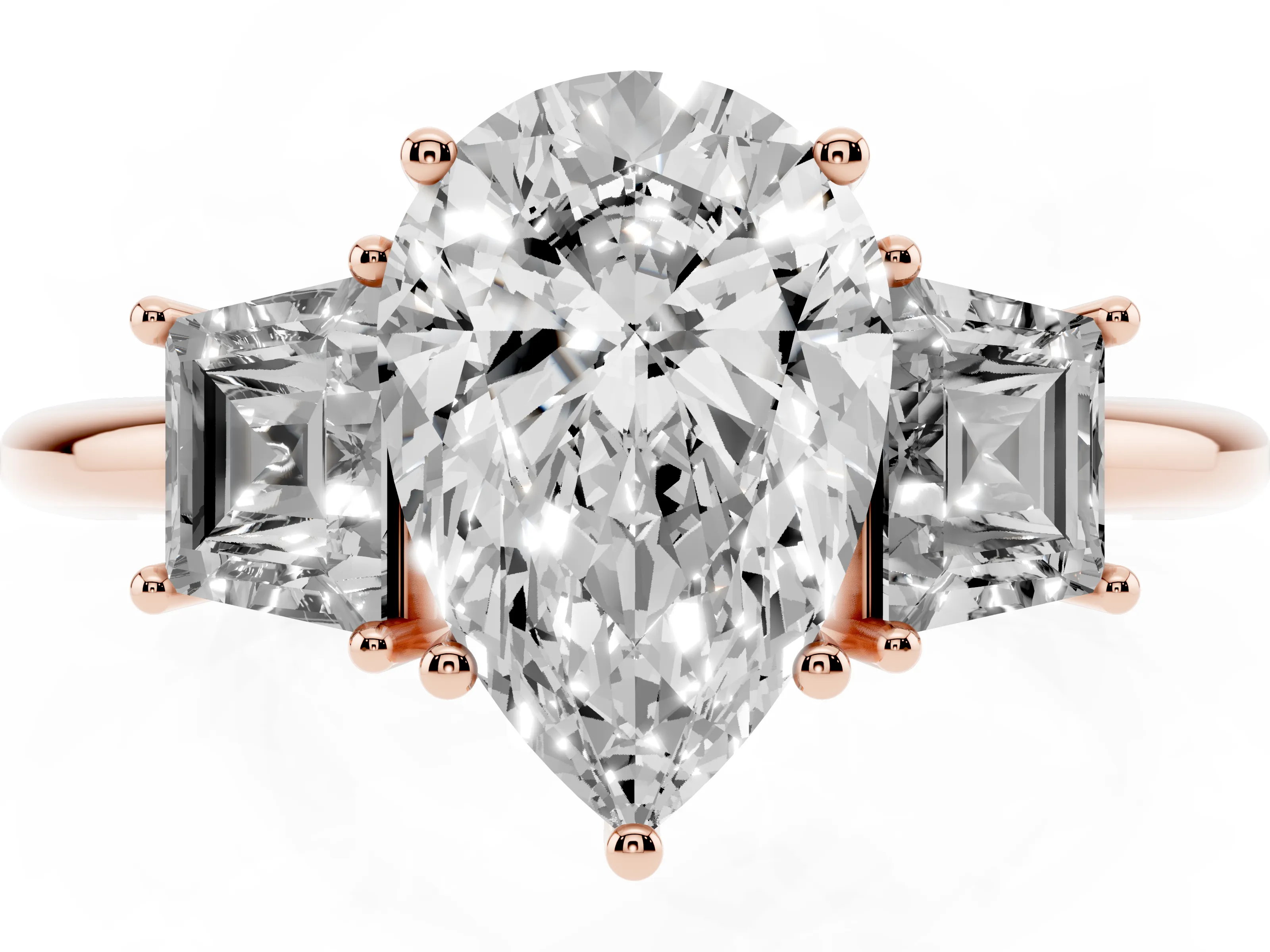 Pear Cut Diamond Three-Stone Ring Set in Rose gold with Trapezoid Side Stones and Prong Setting