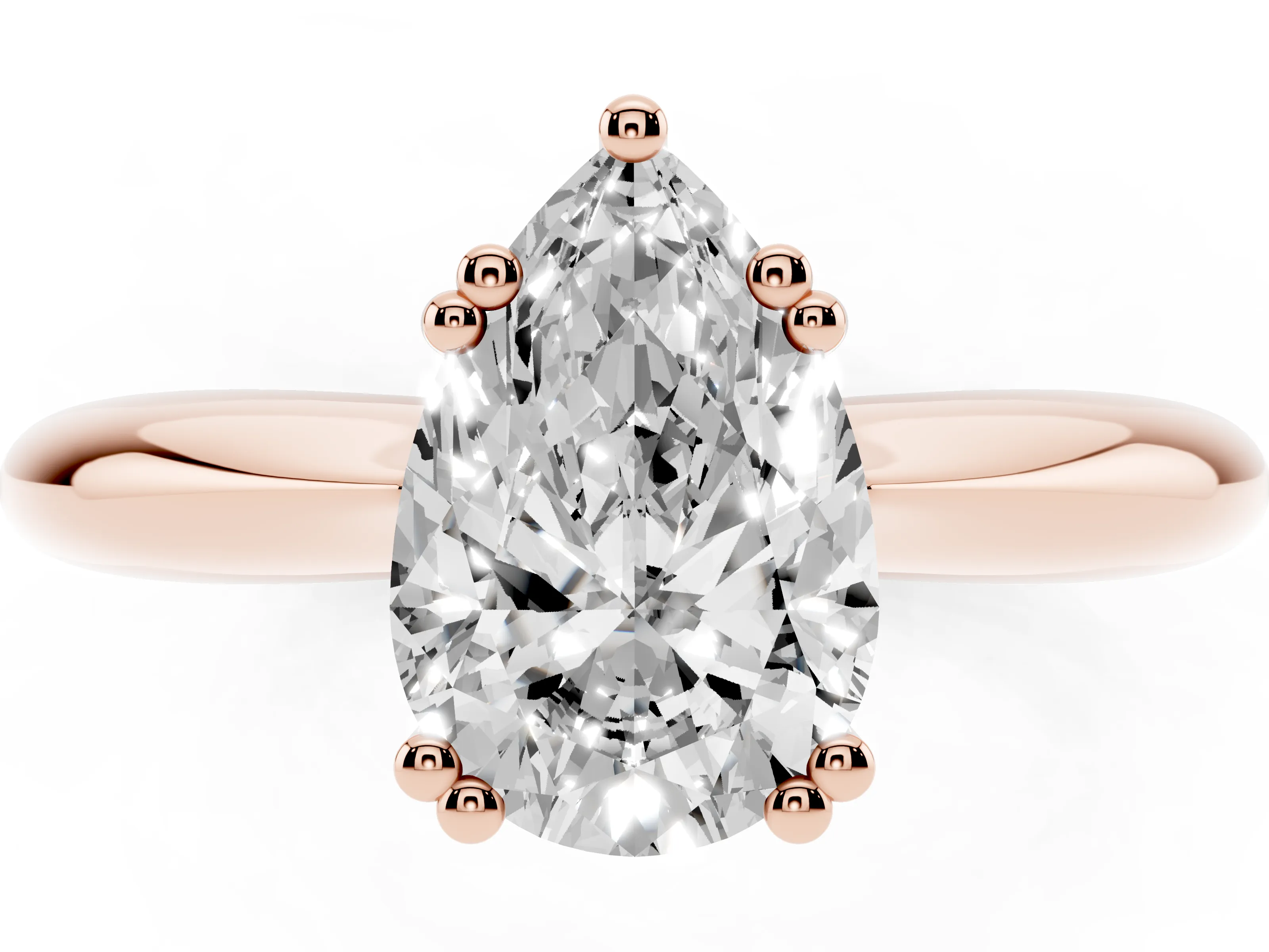 Pear Cut Diamond Solitaire Engagement Ring Set in Rose gold with Tapered Band and Prong Setting
