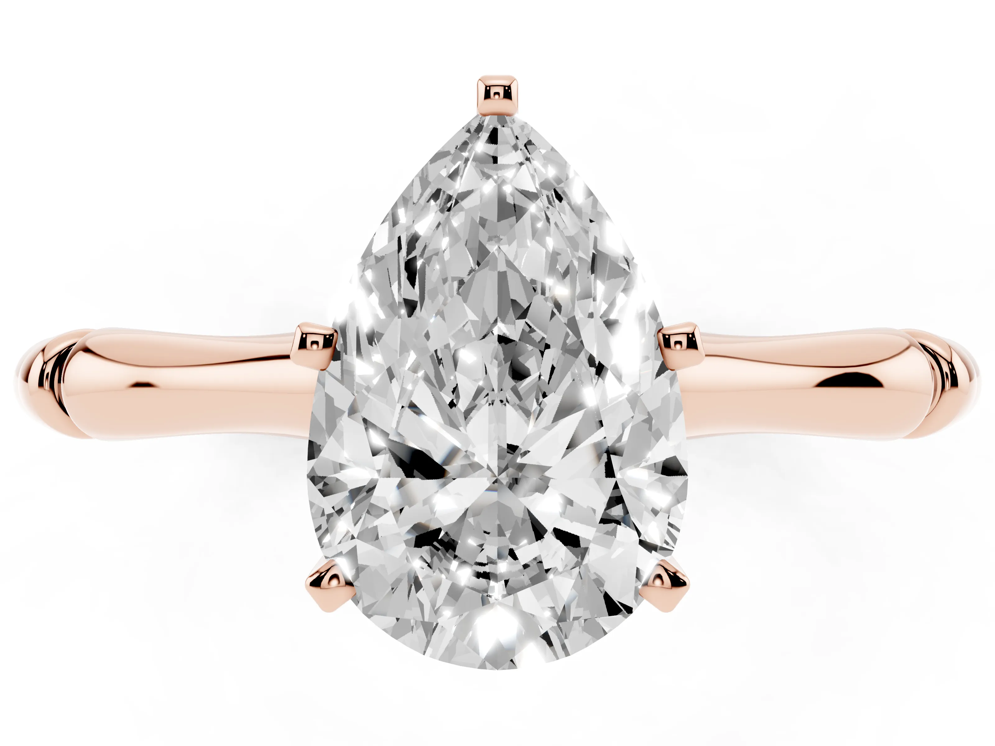 Pear Cut Diamond Solitaire Ring Set in Rose gold with Bamboo Band and Prong Setting