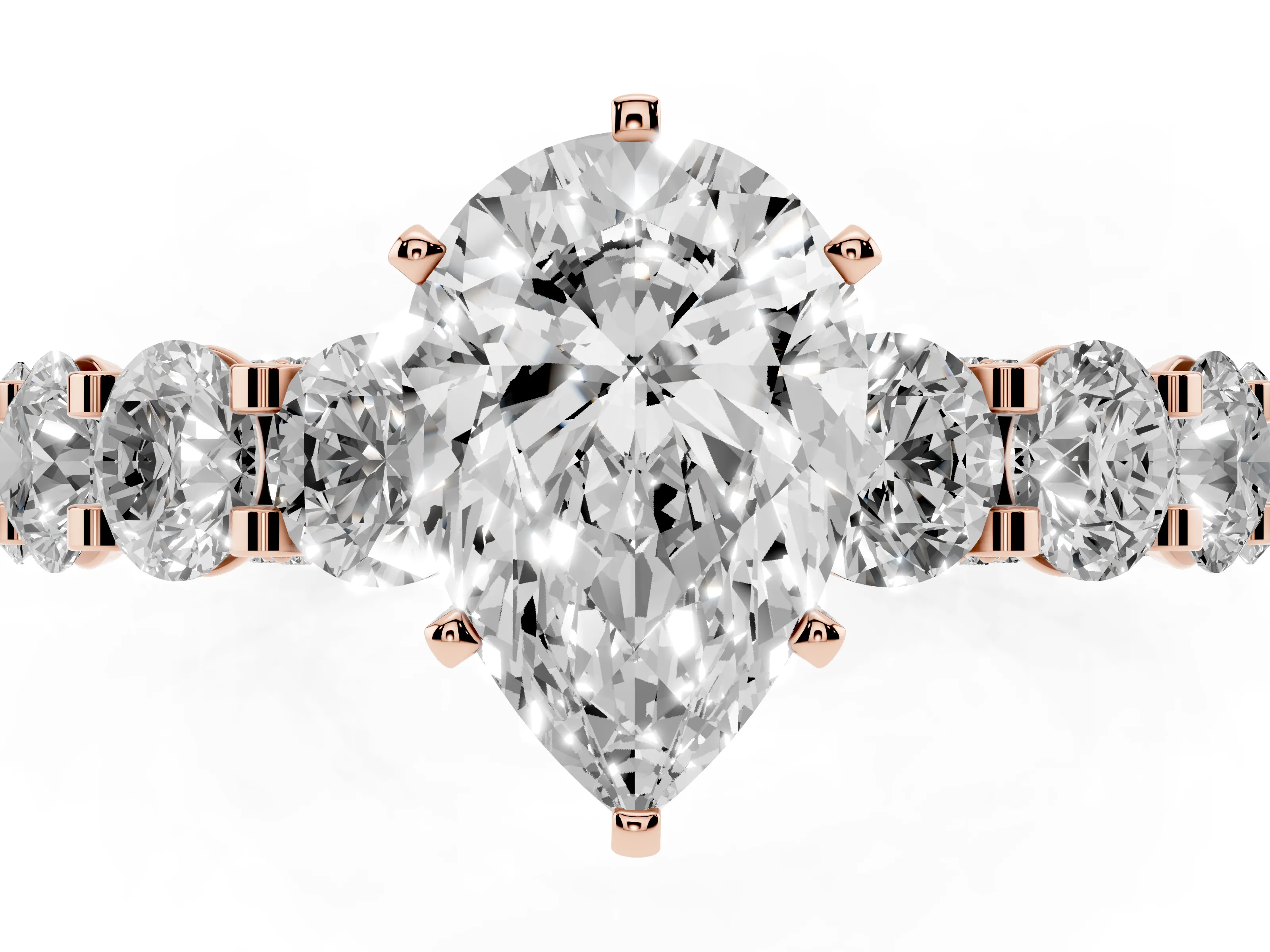 Pear Cut Diamond Side Stone Ring Set in Rose gold with Alternating Round and Oval Side Stones