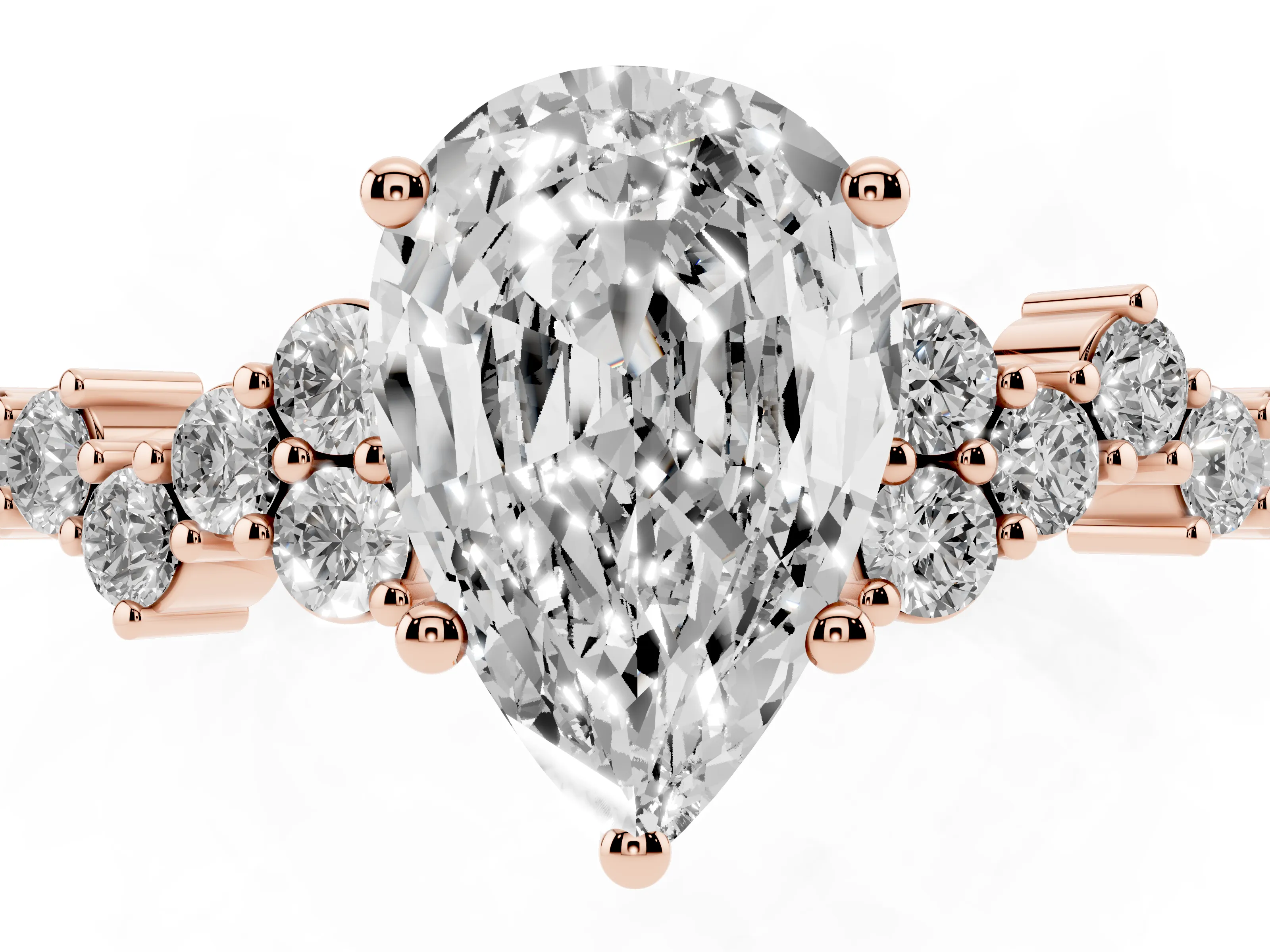 Pear Cut Diamond Ring Set in Rose gold with Scattered Round Accents