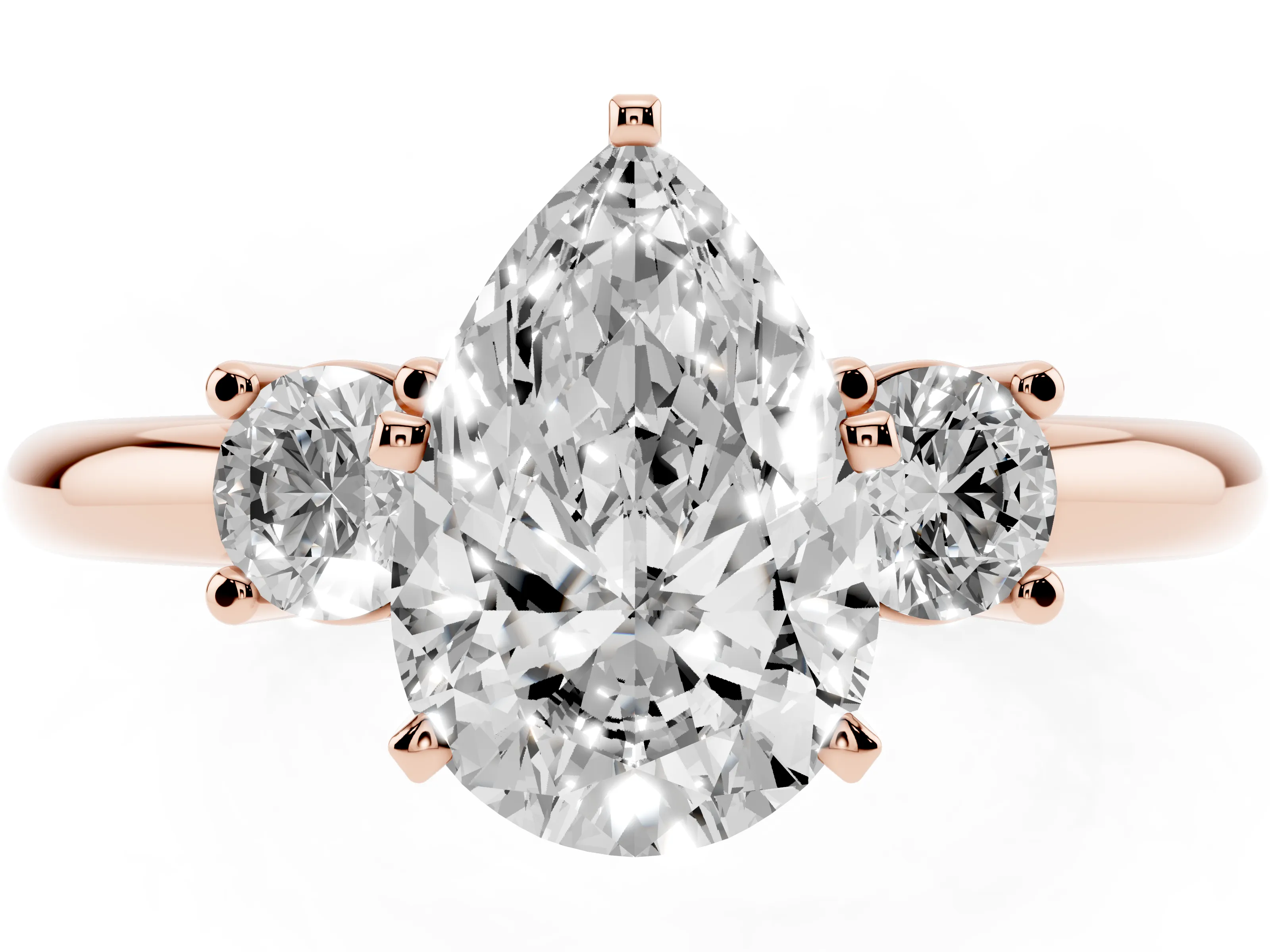 Three-Stone Pear Cut Diamond Ring Set in Rose gold with Prong Setting and Plain Band