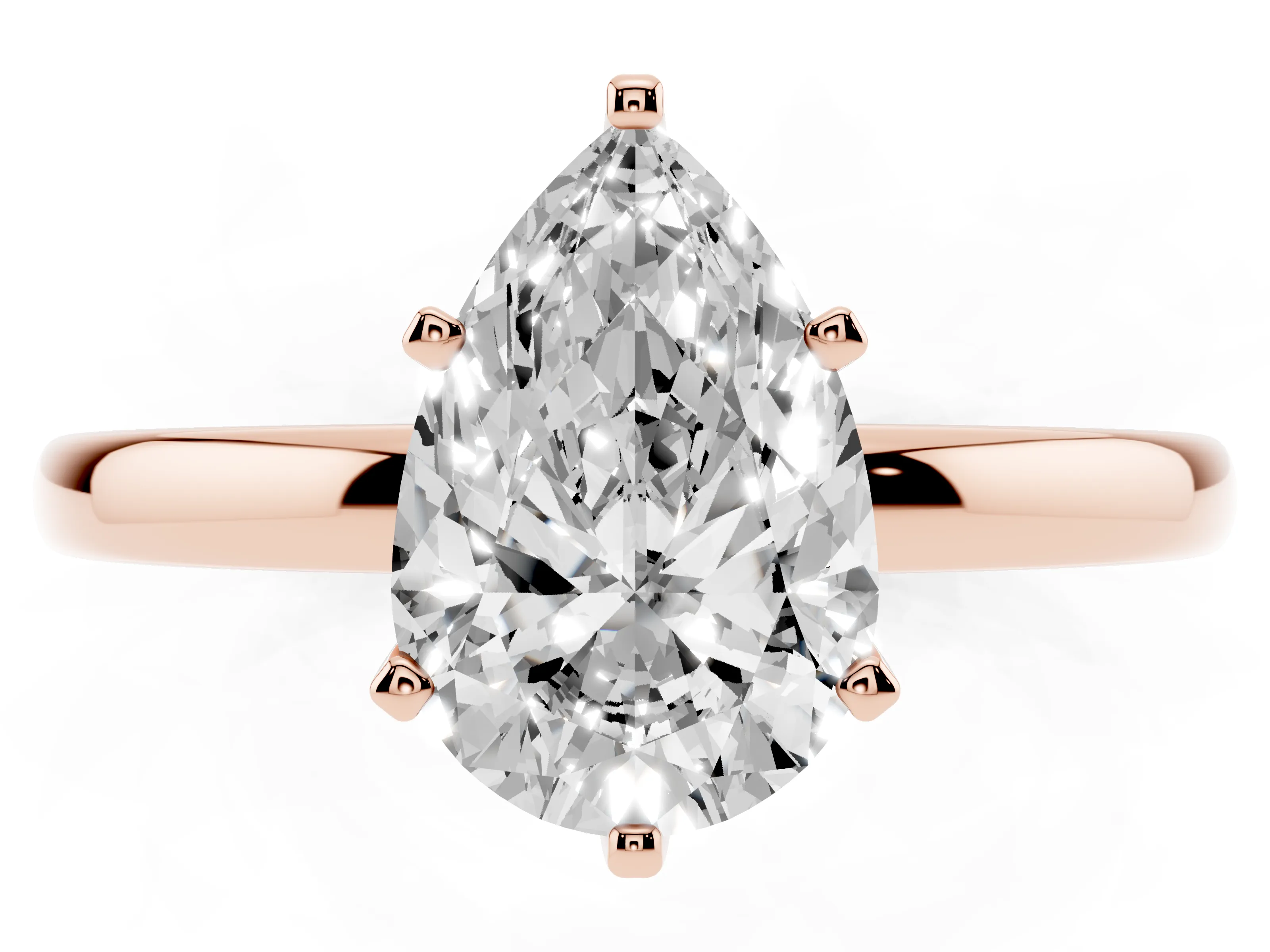 Pear Cut Diamond Solitaire Ring Set in Rose gold with Raised Prong Setting on a Classic Band